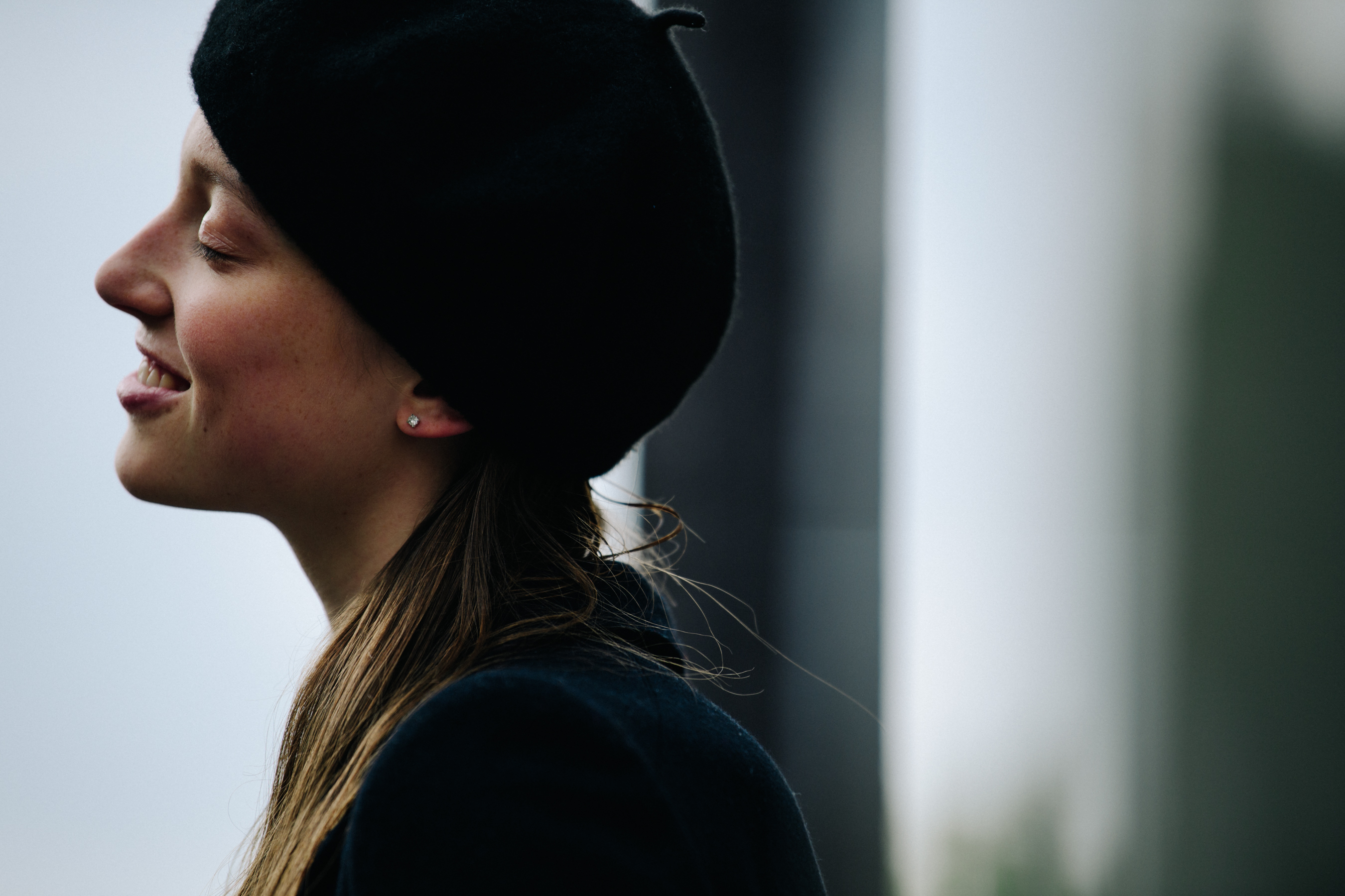 Model wearing black beret