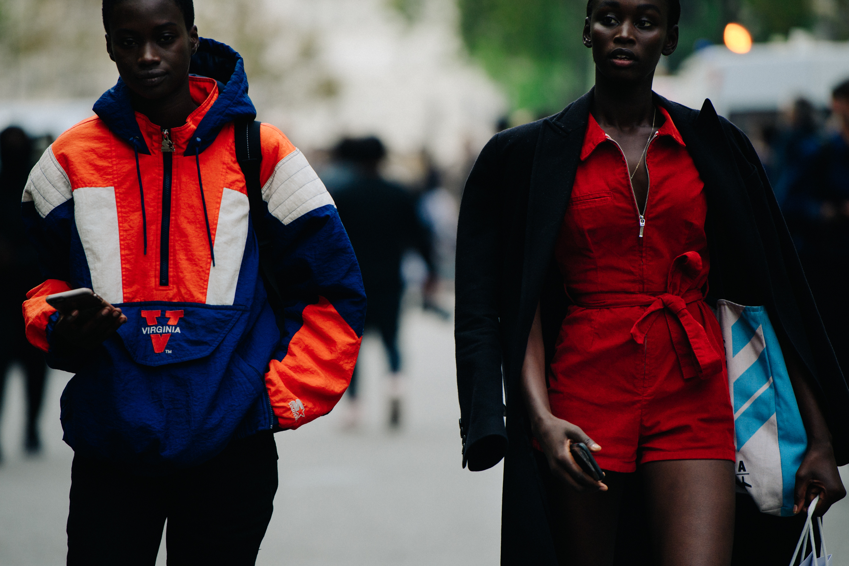 Two models wearing red