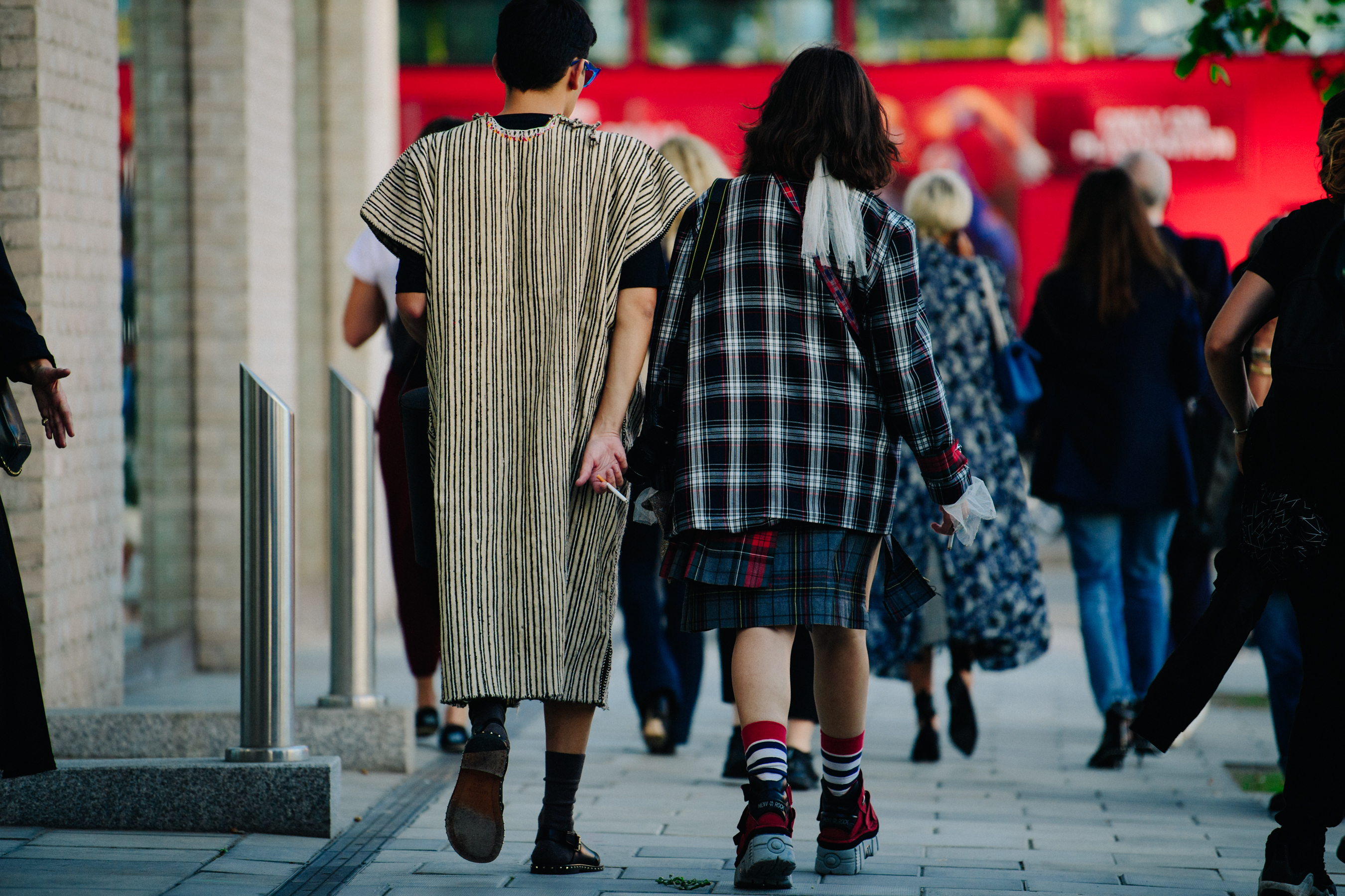 Couple wearing stripes and check