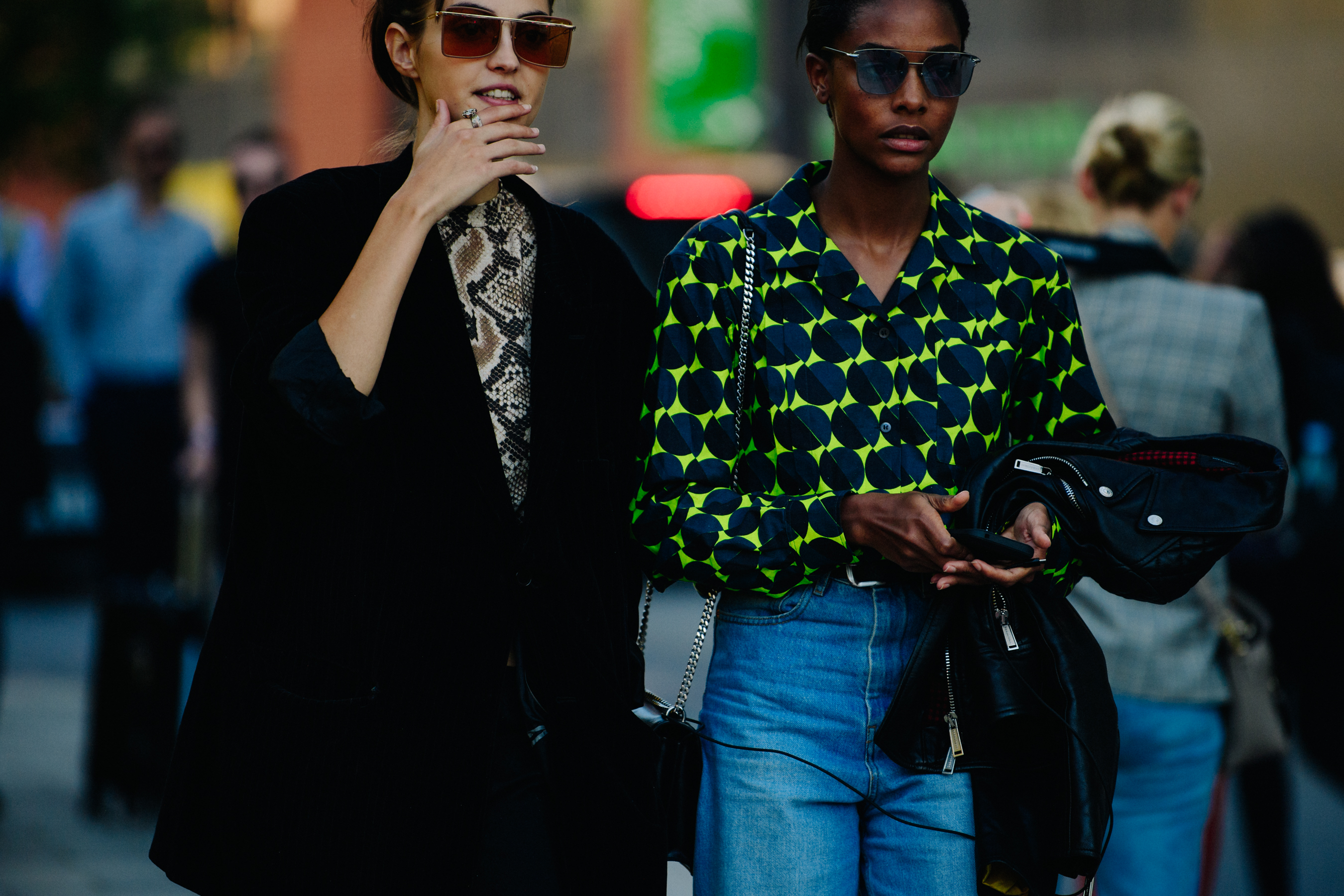 Two models wearing pattern shirts