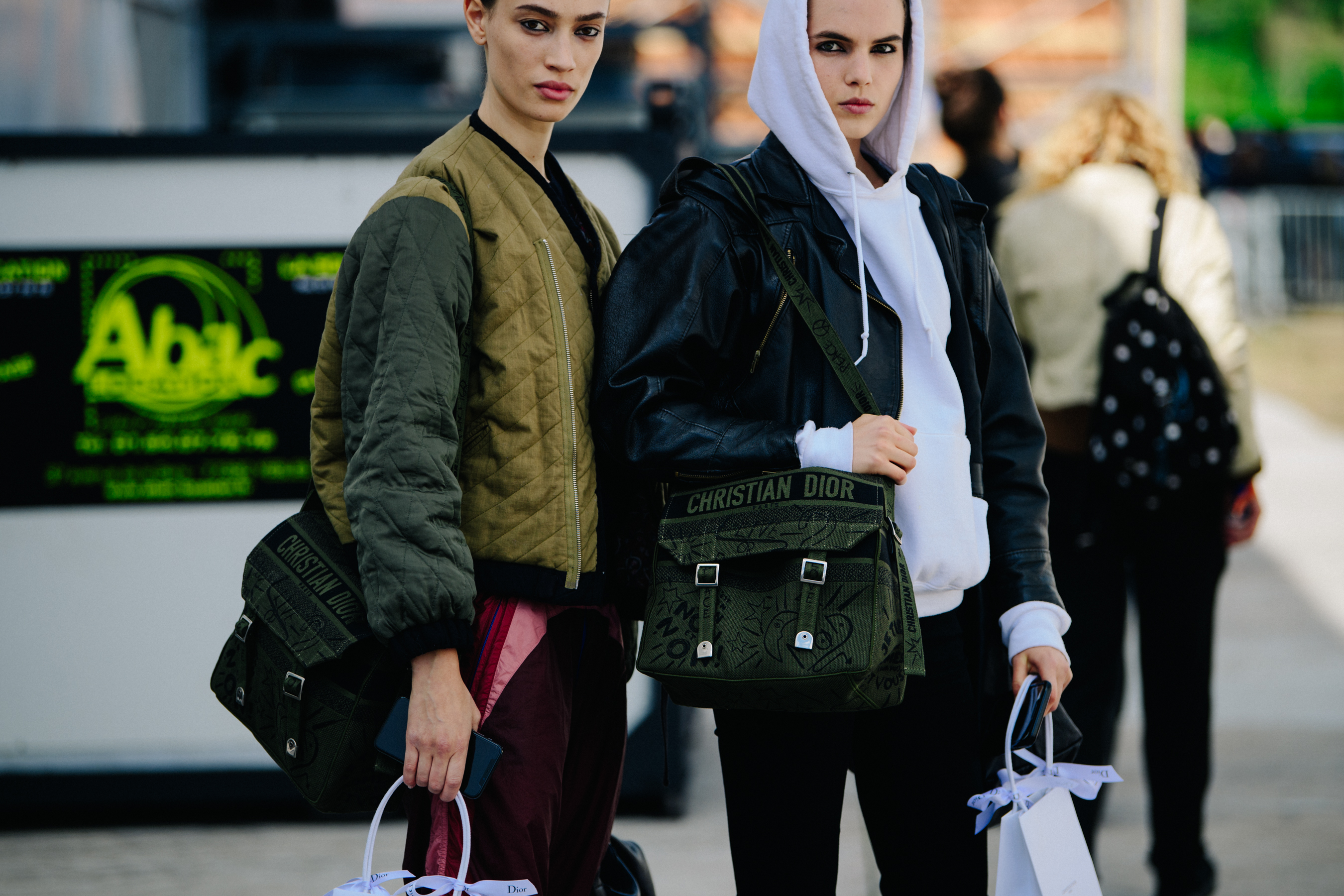 Model carrying Christian Dior bag