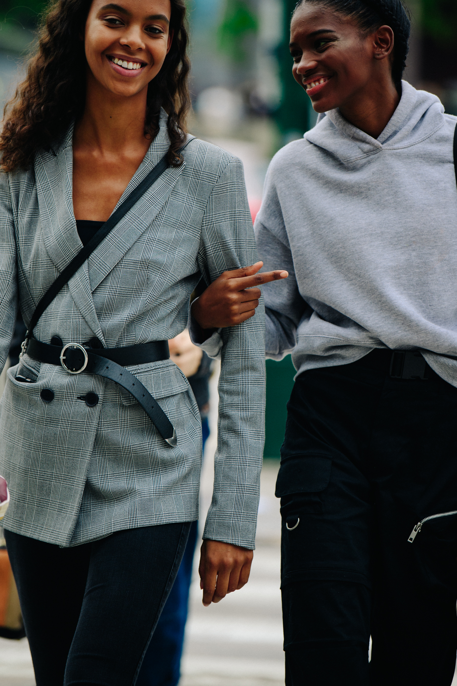 Two models wearing grey