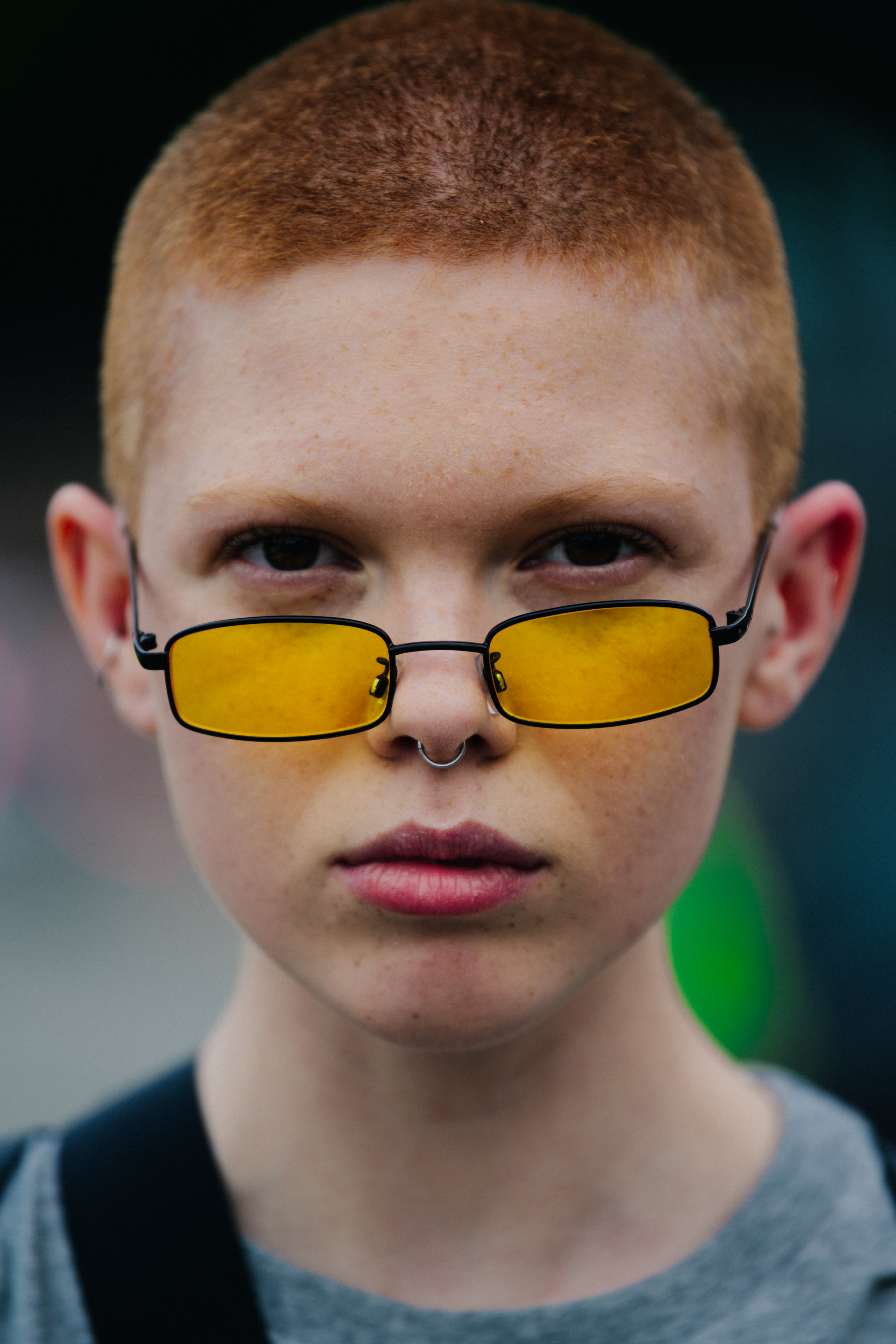 Portrait of model with shaved red hair