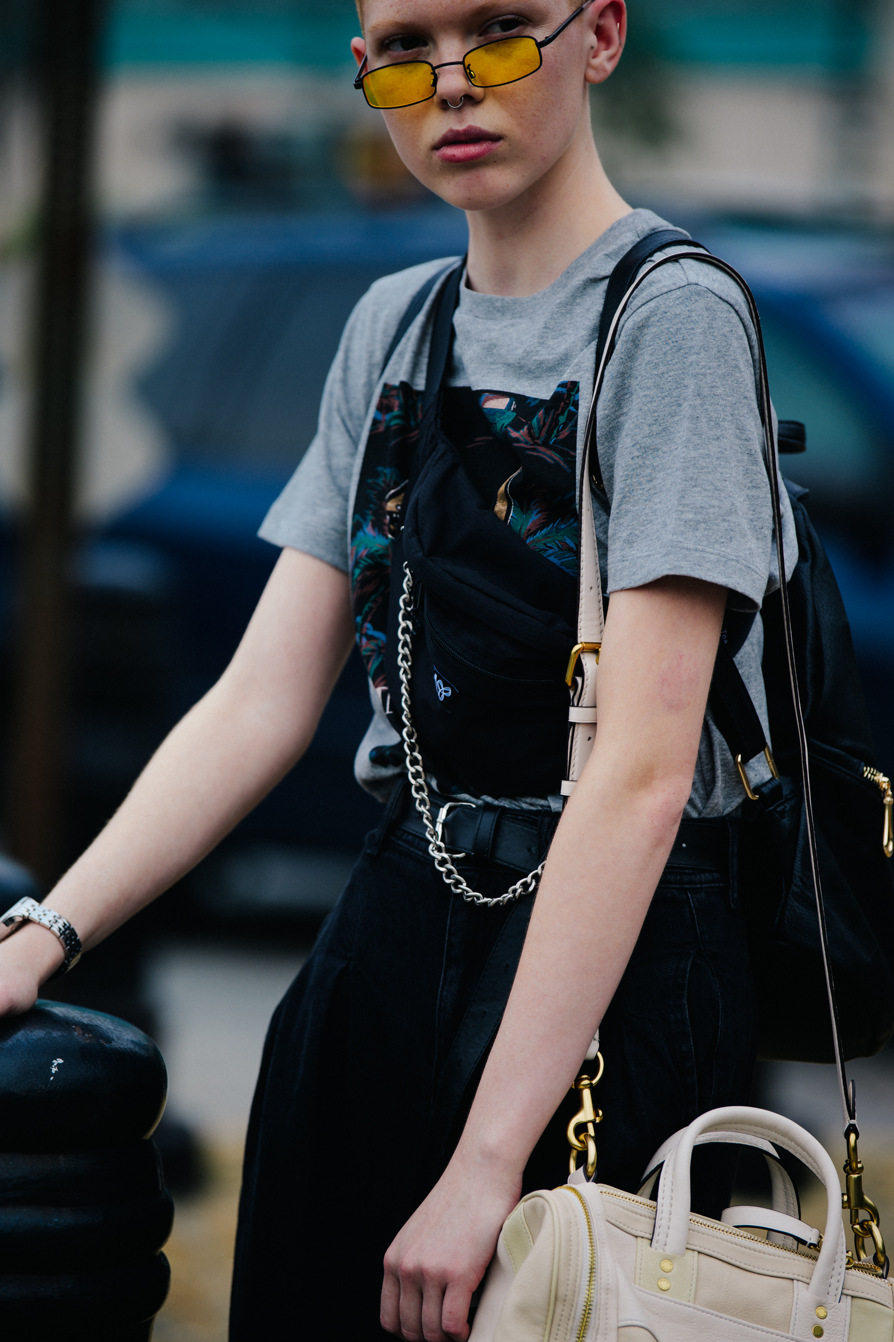 Model wearing yellow sunglasses