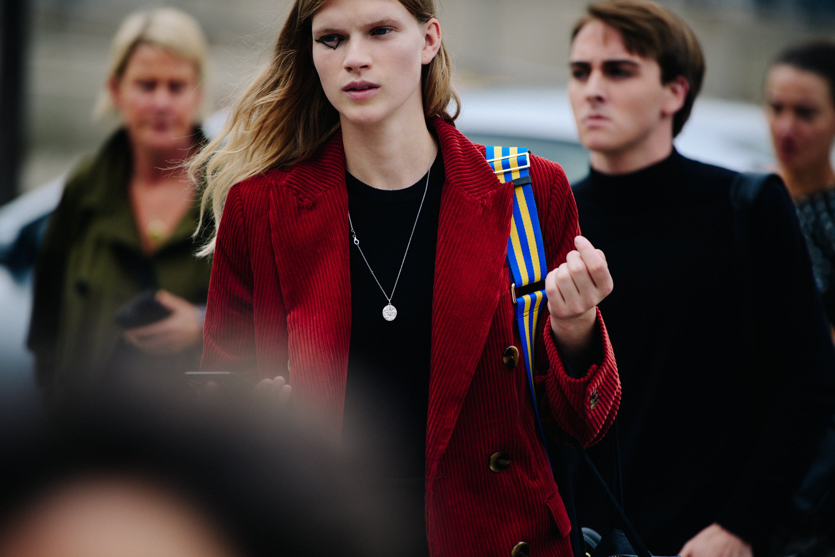 Model wearing red corduroy jacket