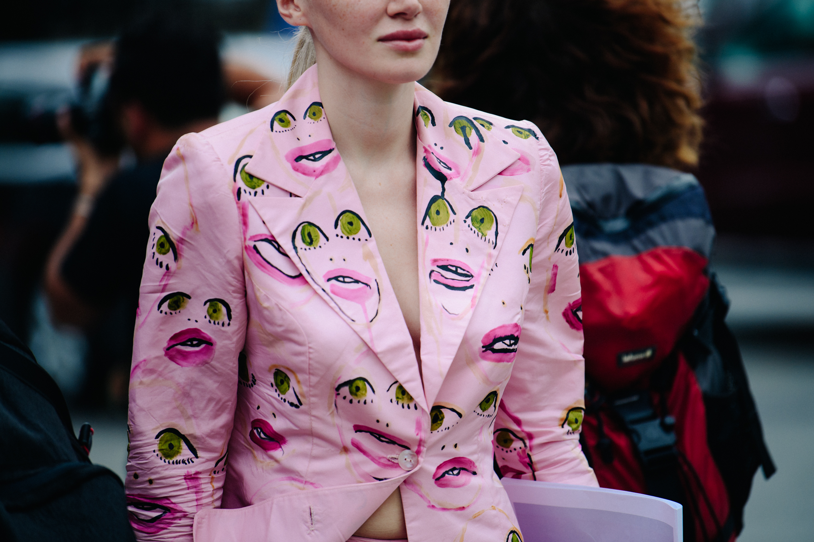 Woman wearing pink jacket