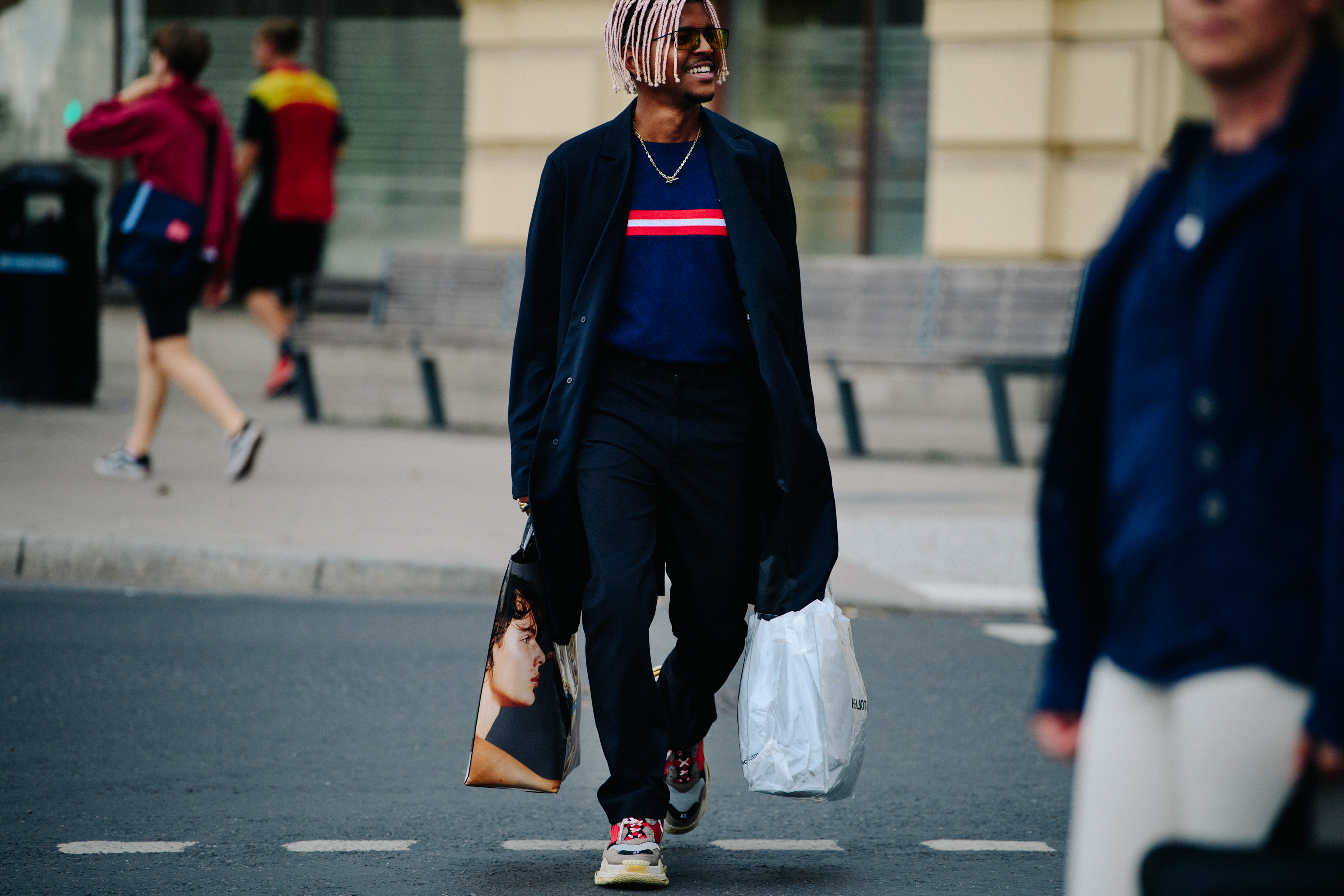 Man carrying Acne bag