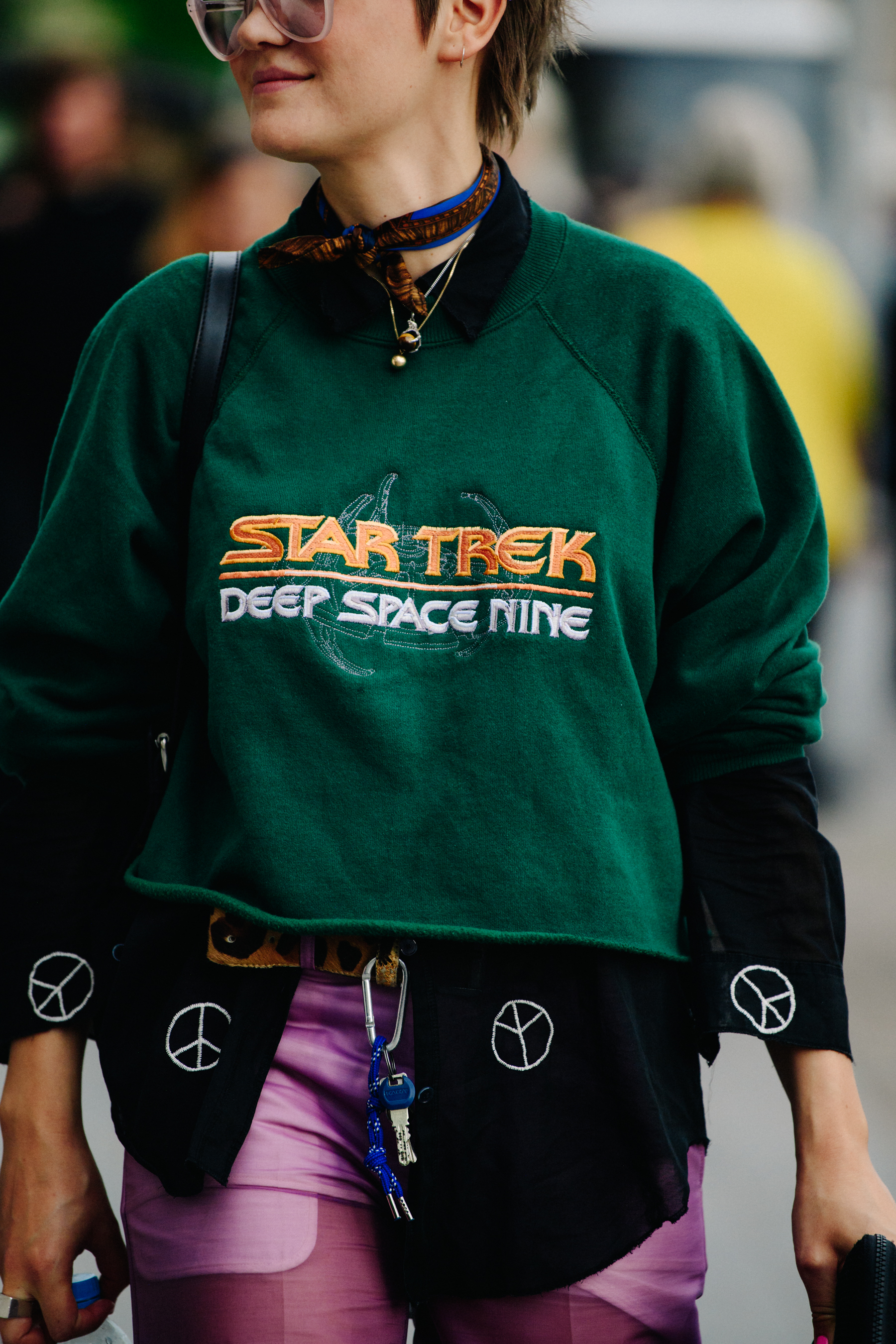 Woman wearing green Star Trek jumper