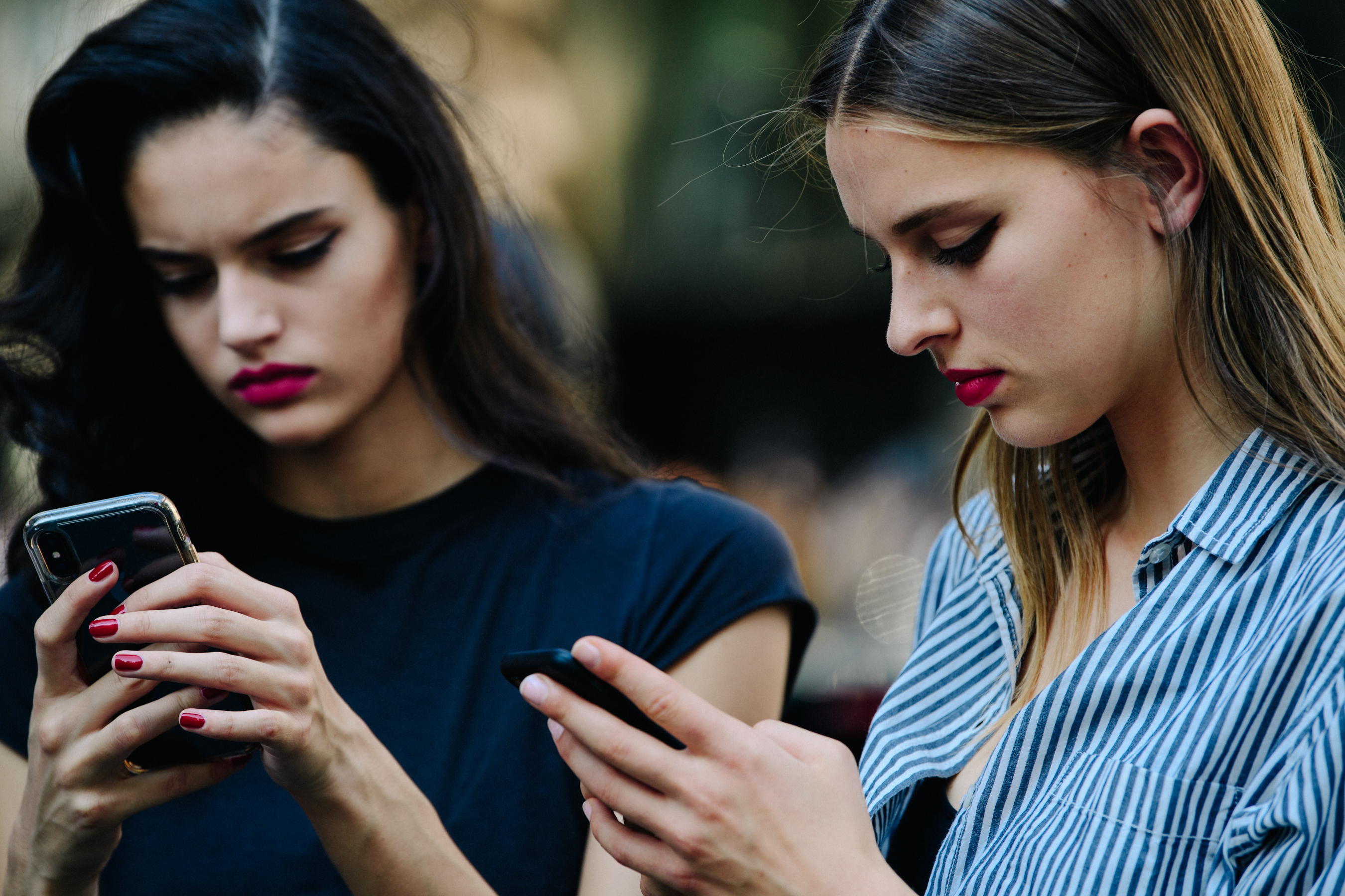 Two models using iPhones