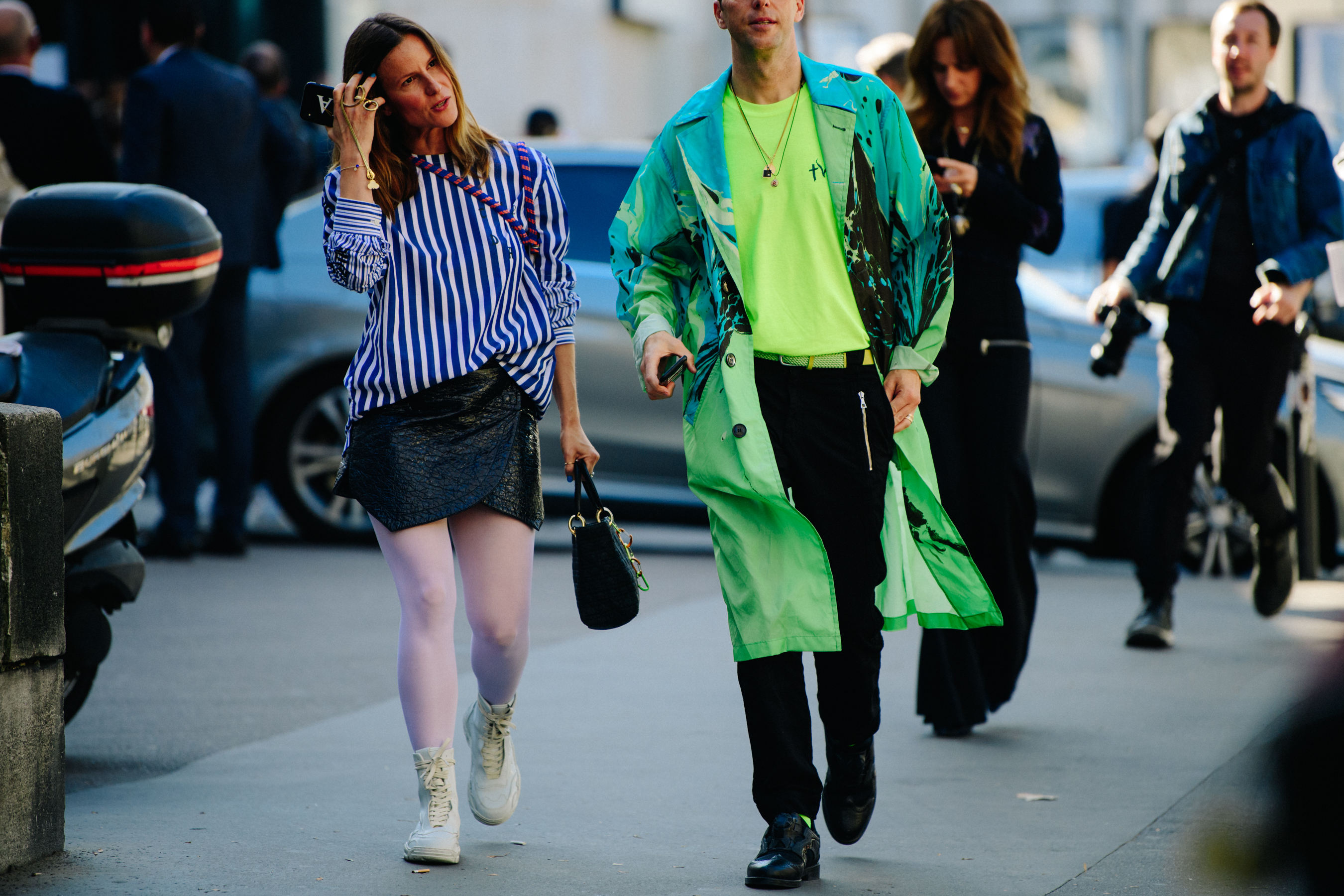 Couple wearing green and pink