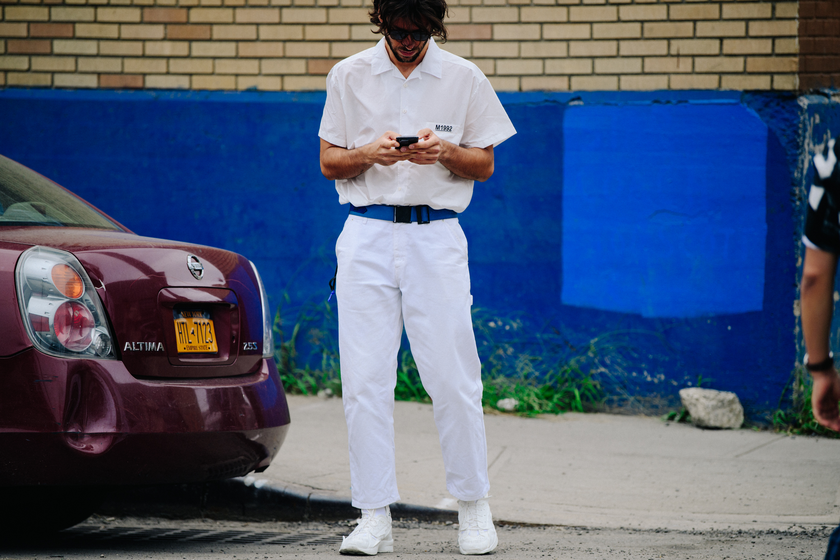 Man wearing white outfit