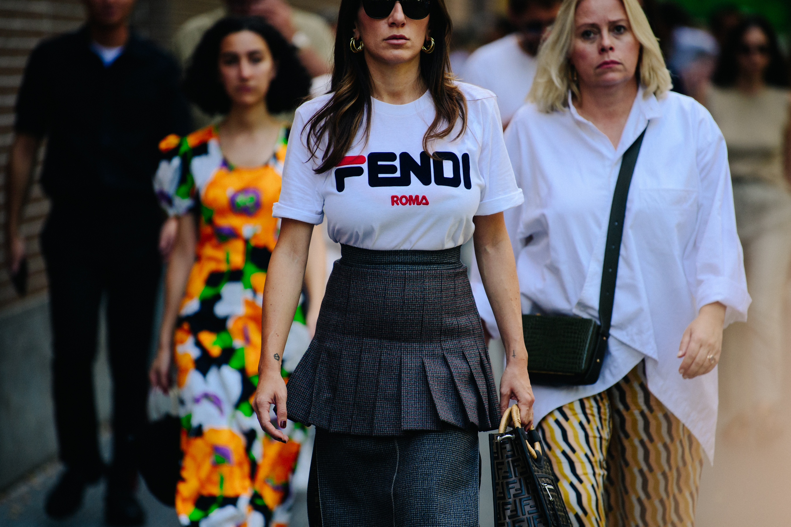 Woman wearing Fendi tee shirt