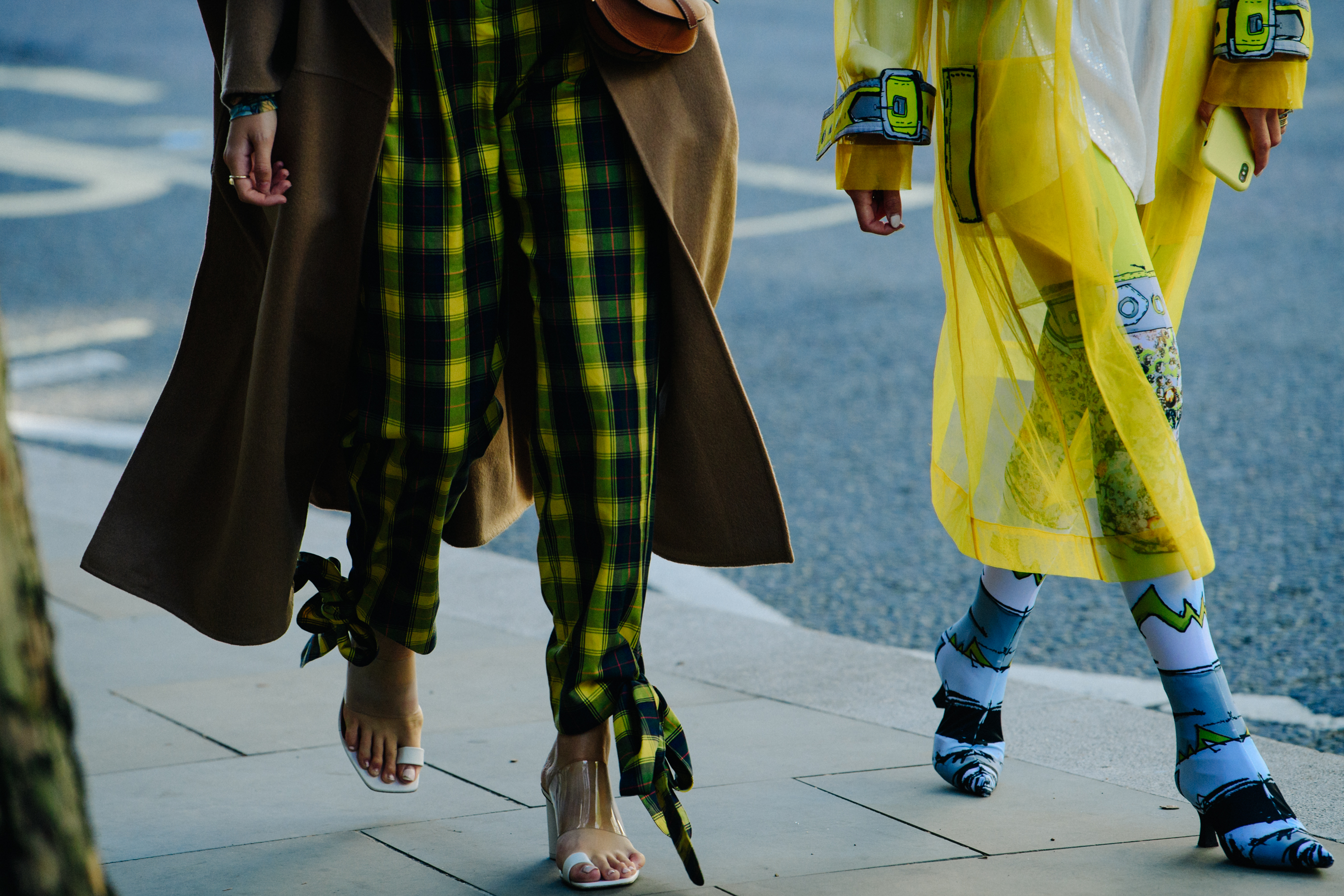 Two women wearing yellow