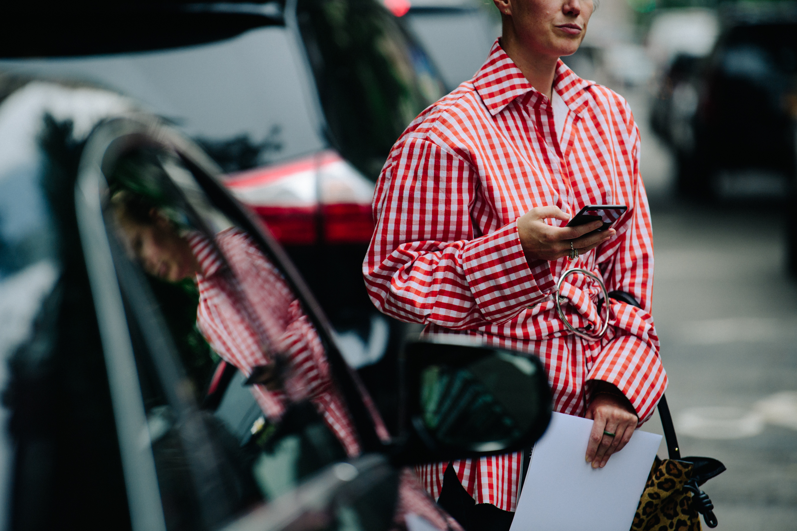 Woman wearing red check coat
