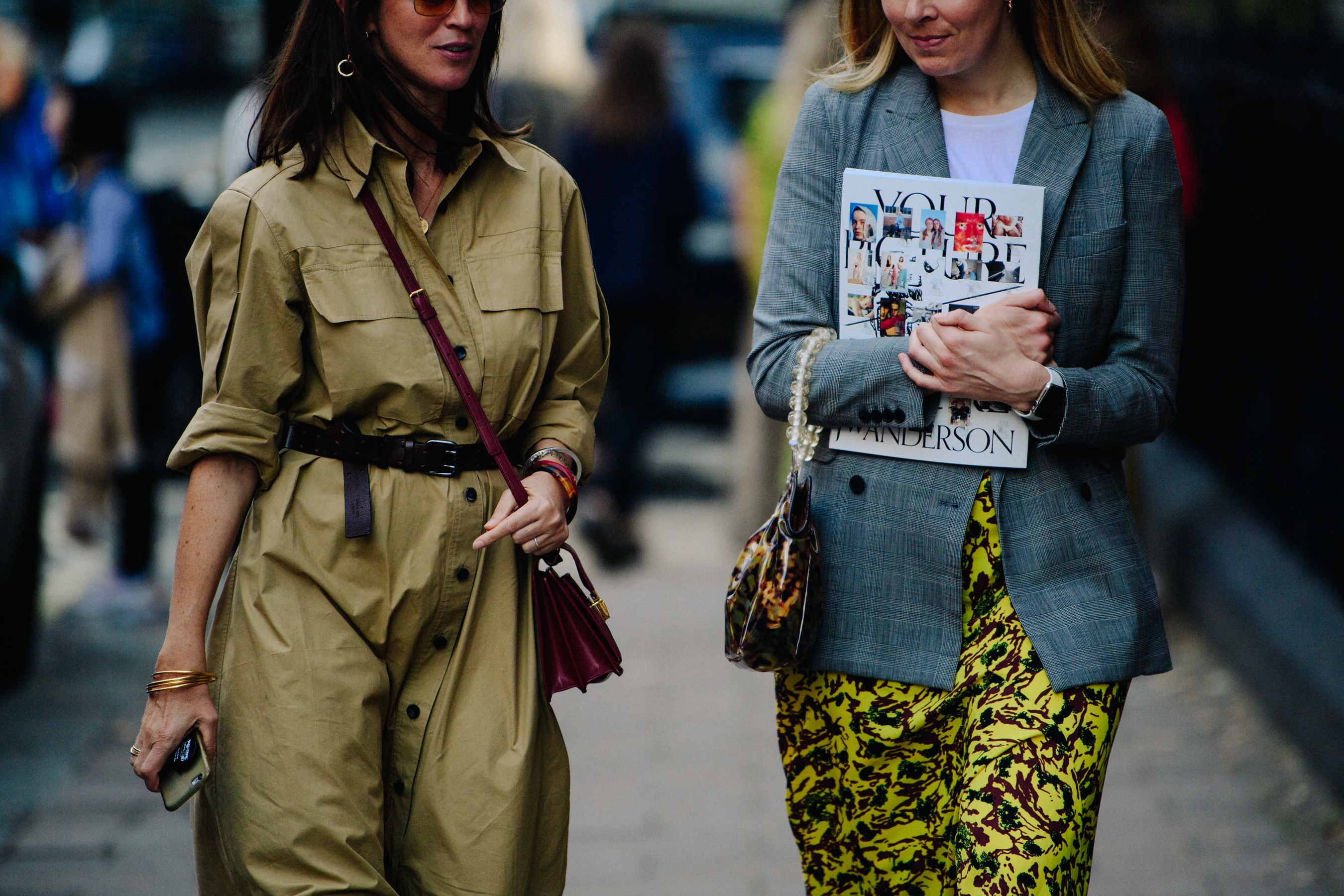 Two women wearing stylish outfits