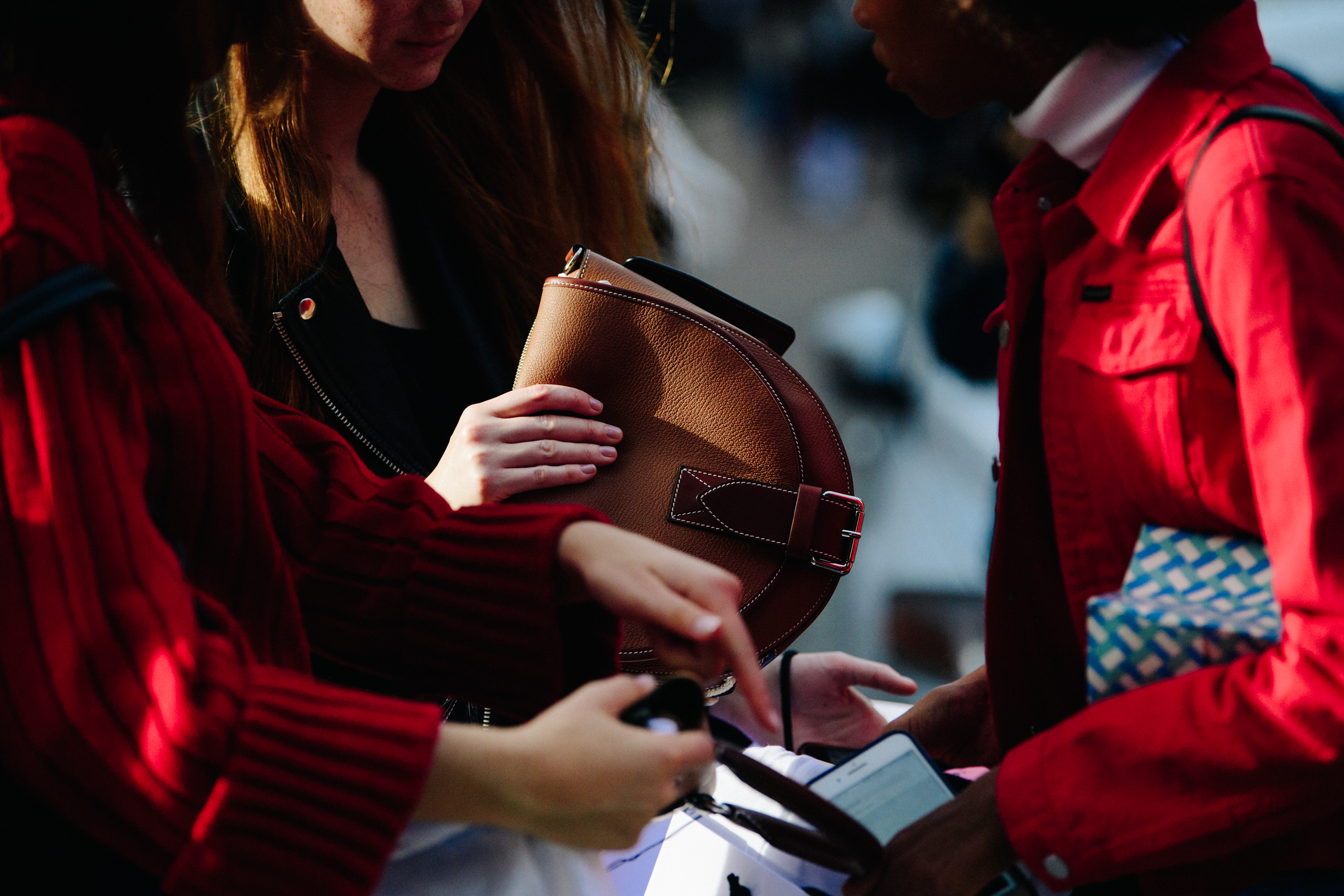 Models carrying JW Anderson bags