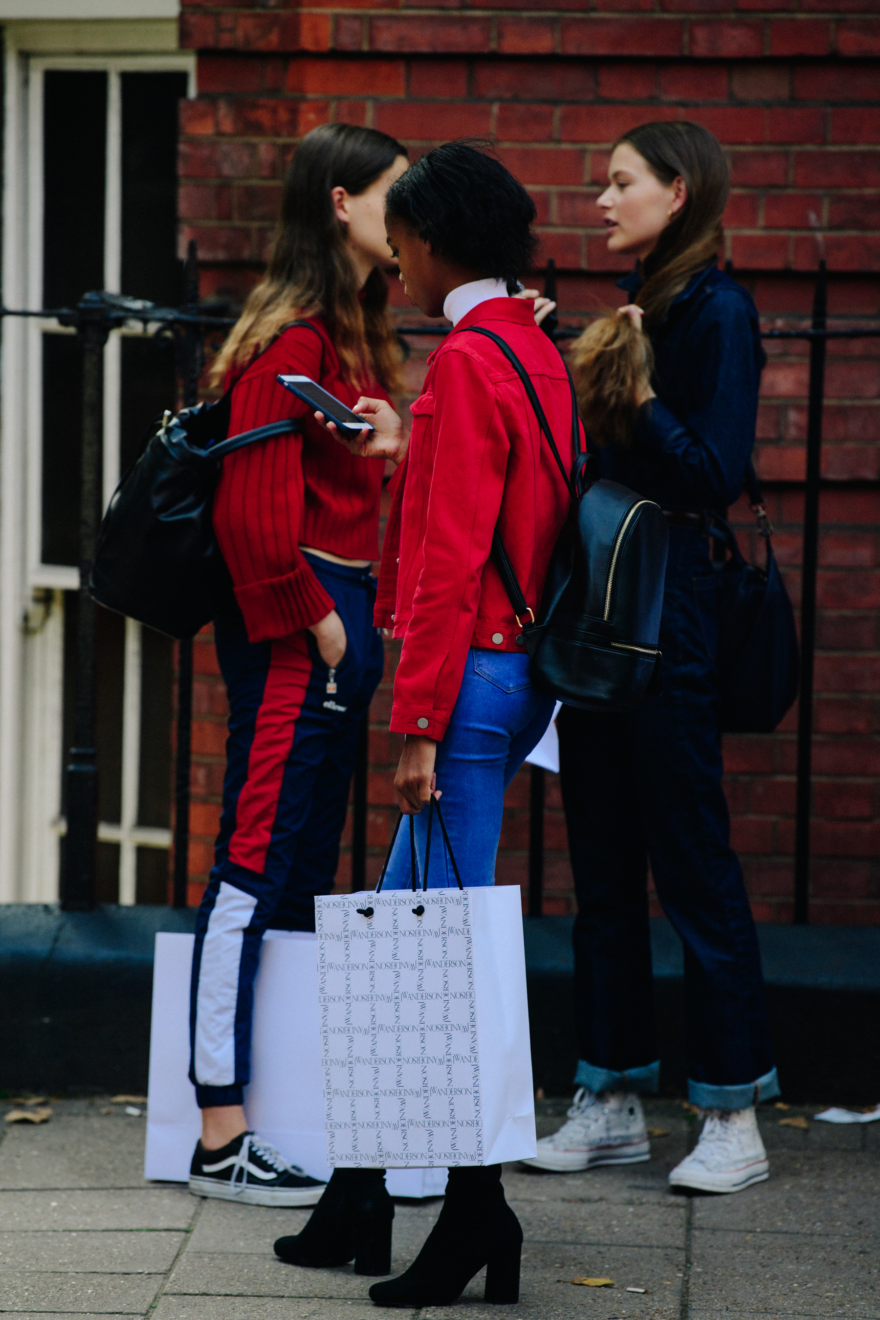 Models carrying JW Anderson bags
