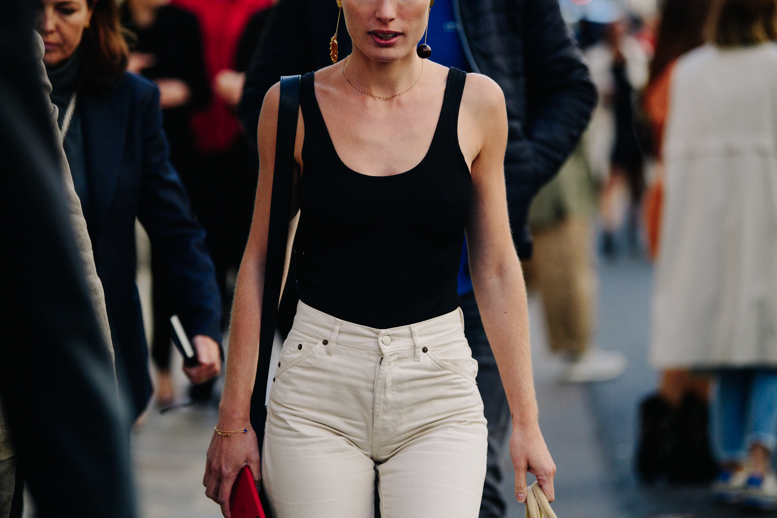 Woman wearing black vest