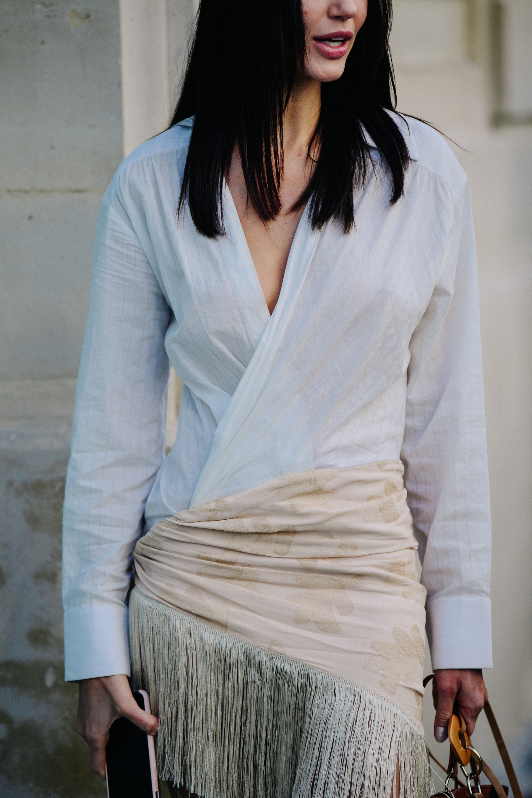 Woman wearing long white shirt