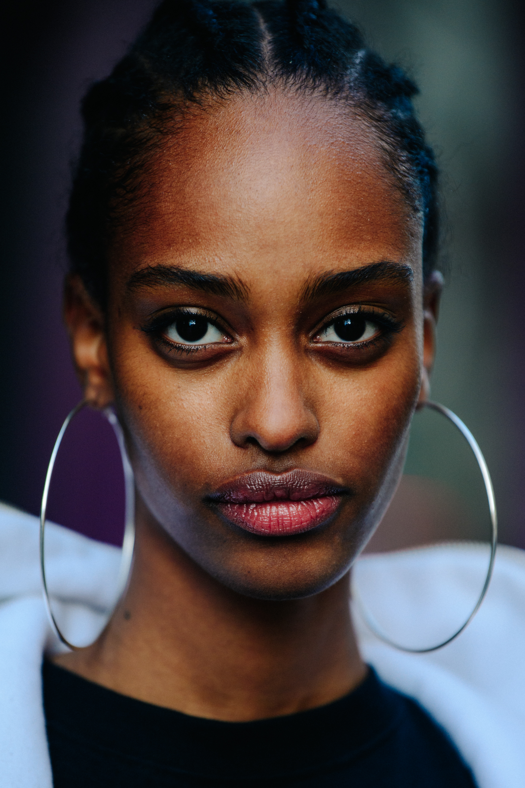 Portrait of model wearing hoop earrings