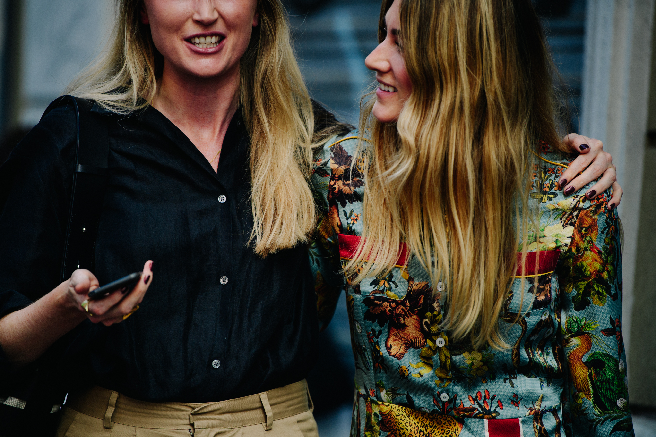 Two woman wearing nice shirts