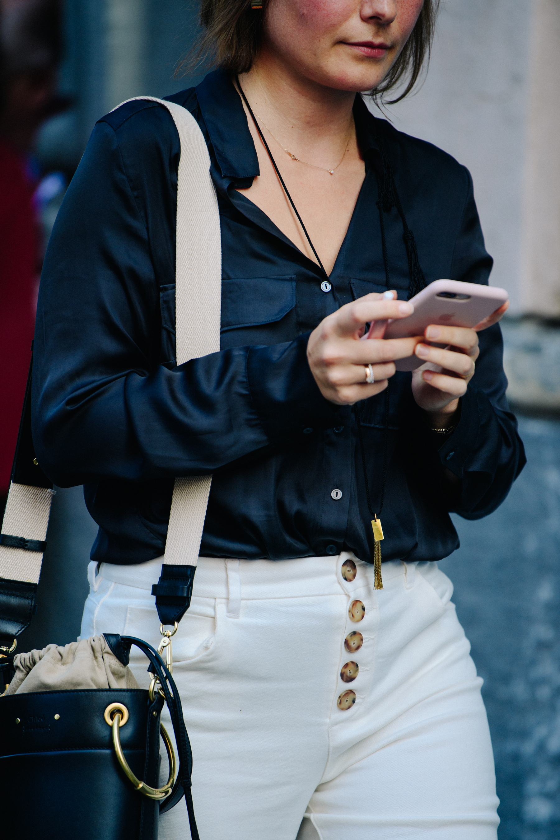 Woman wearing black pocket shirt