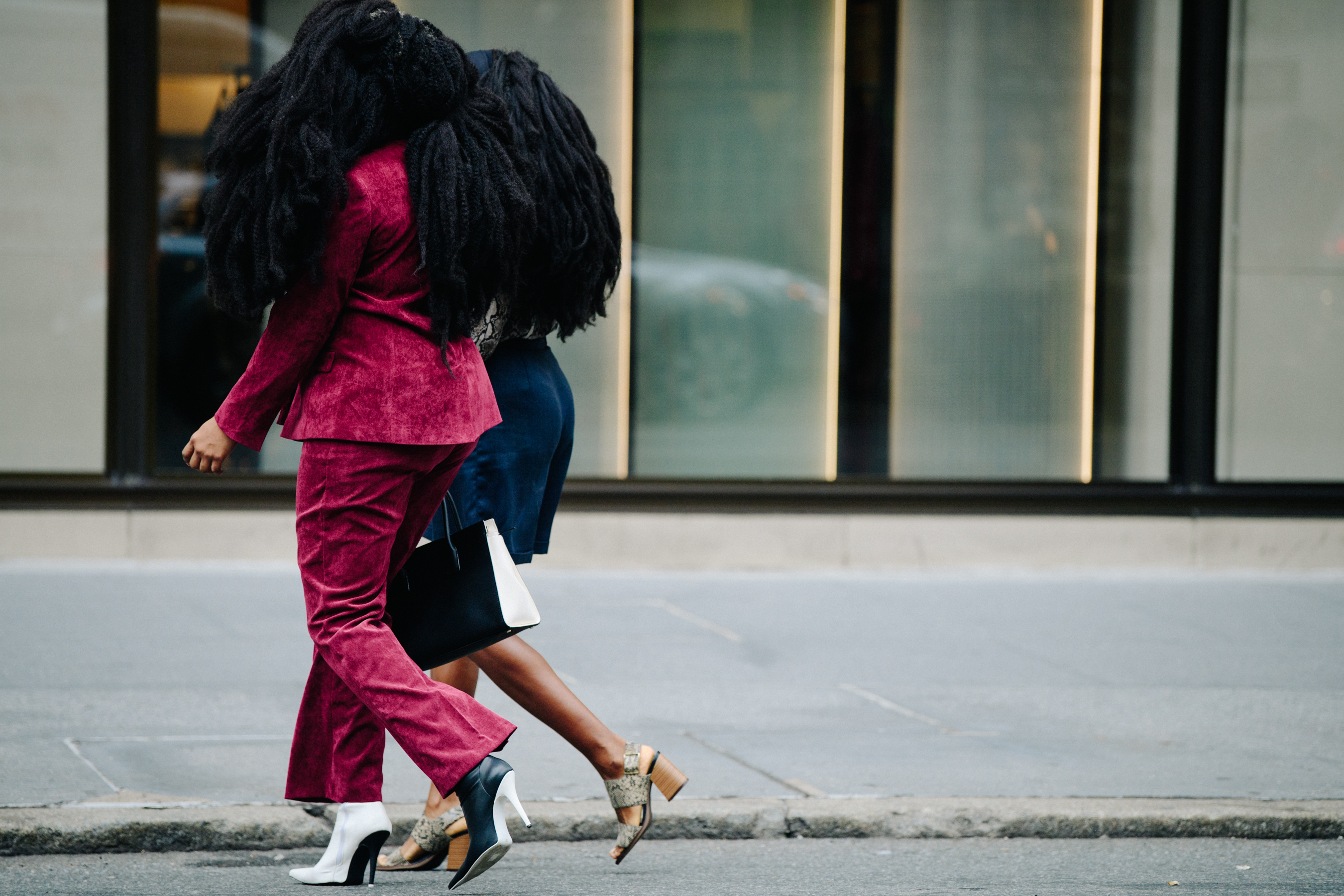 Two women with large dreadlocked hair