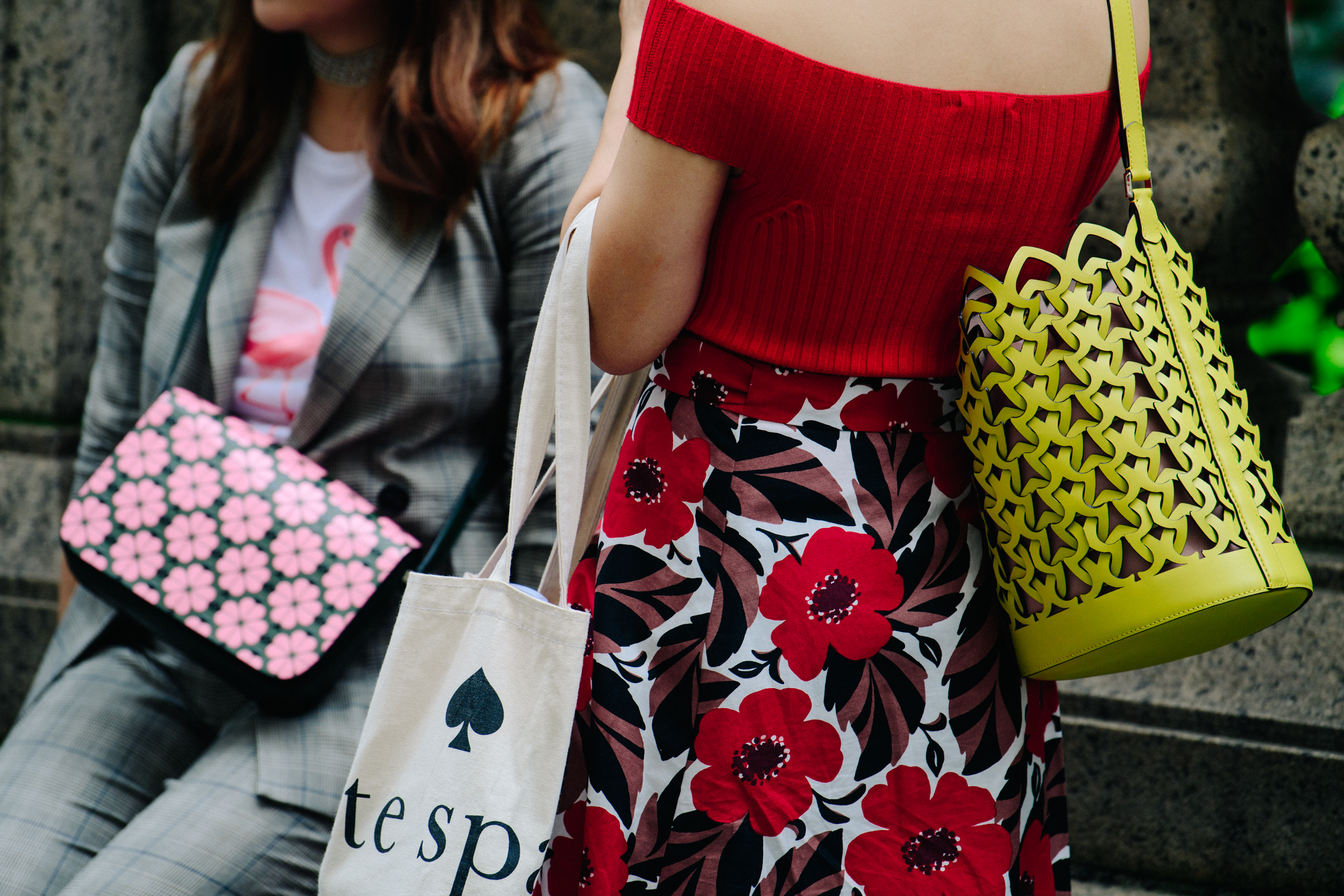 Two women wearing floral patterns