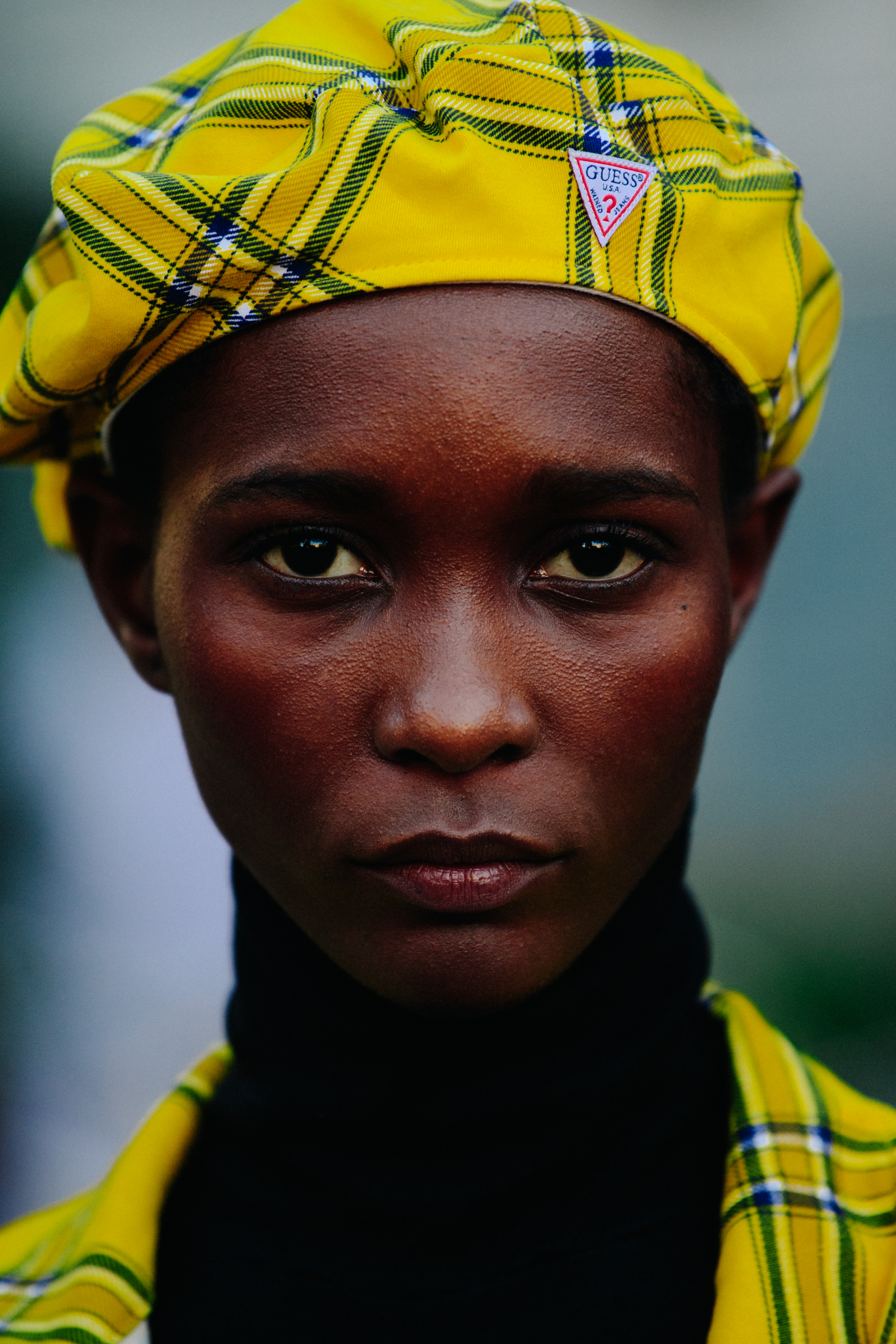 Portrait of model wearing yellow beret
