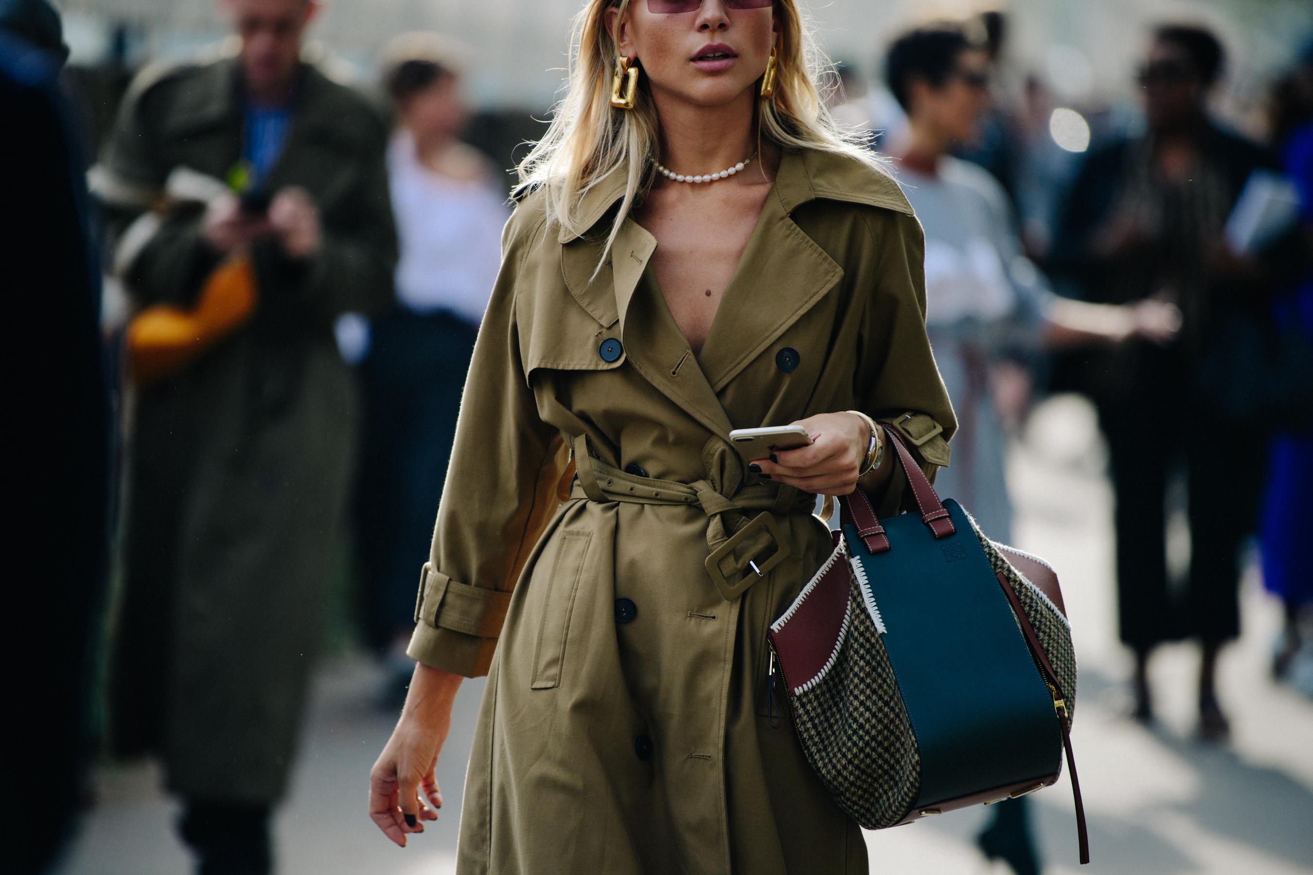 Woman wearing tan coat