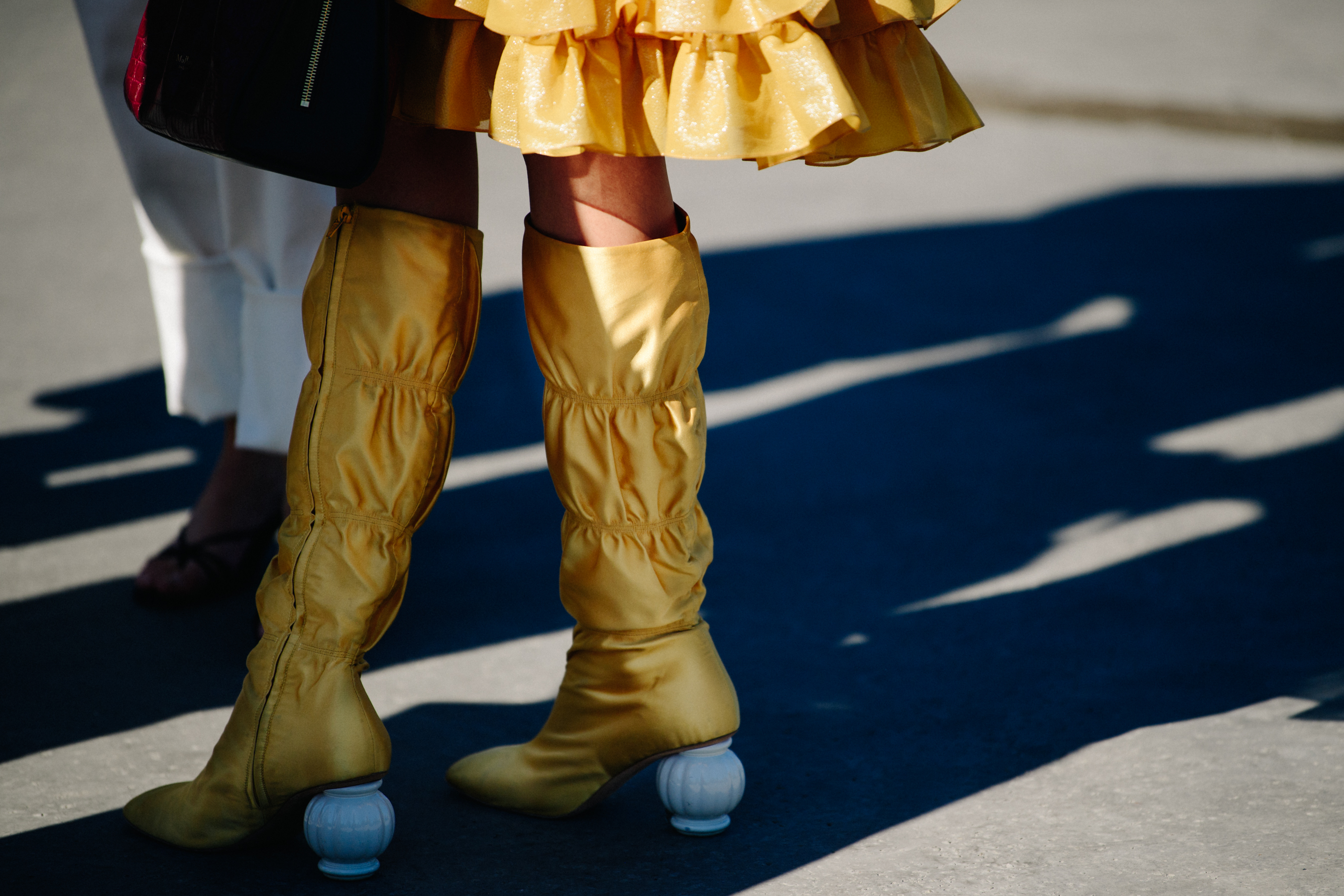 Woman wearing yellow boots