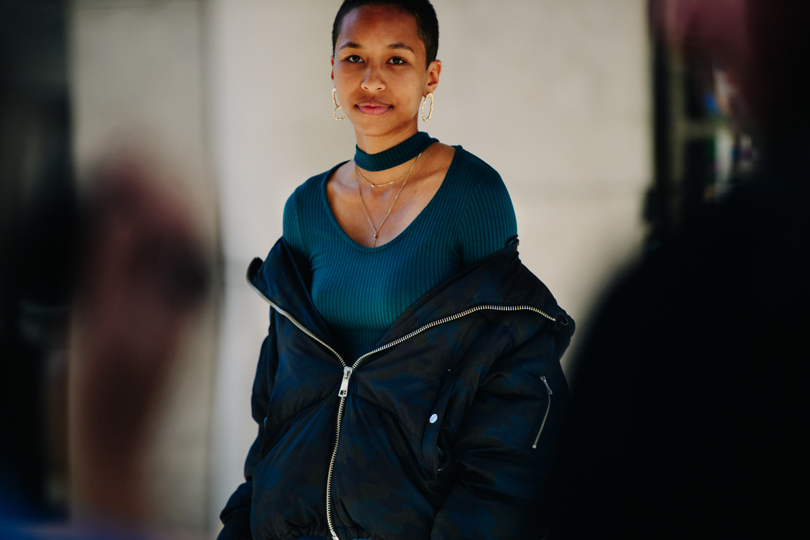 Woman wearing black puffer coat