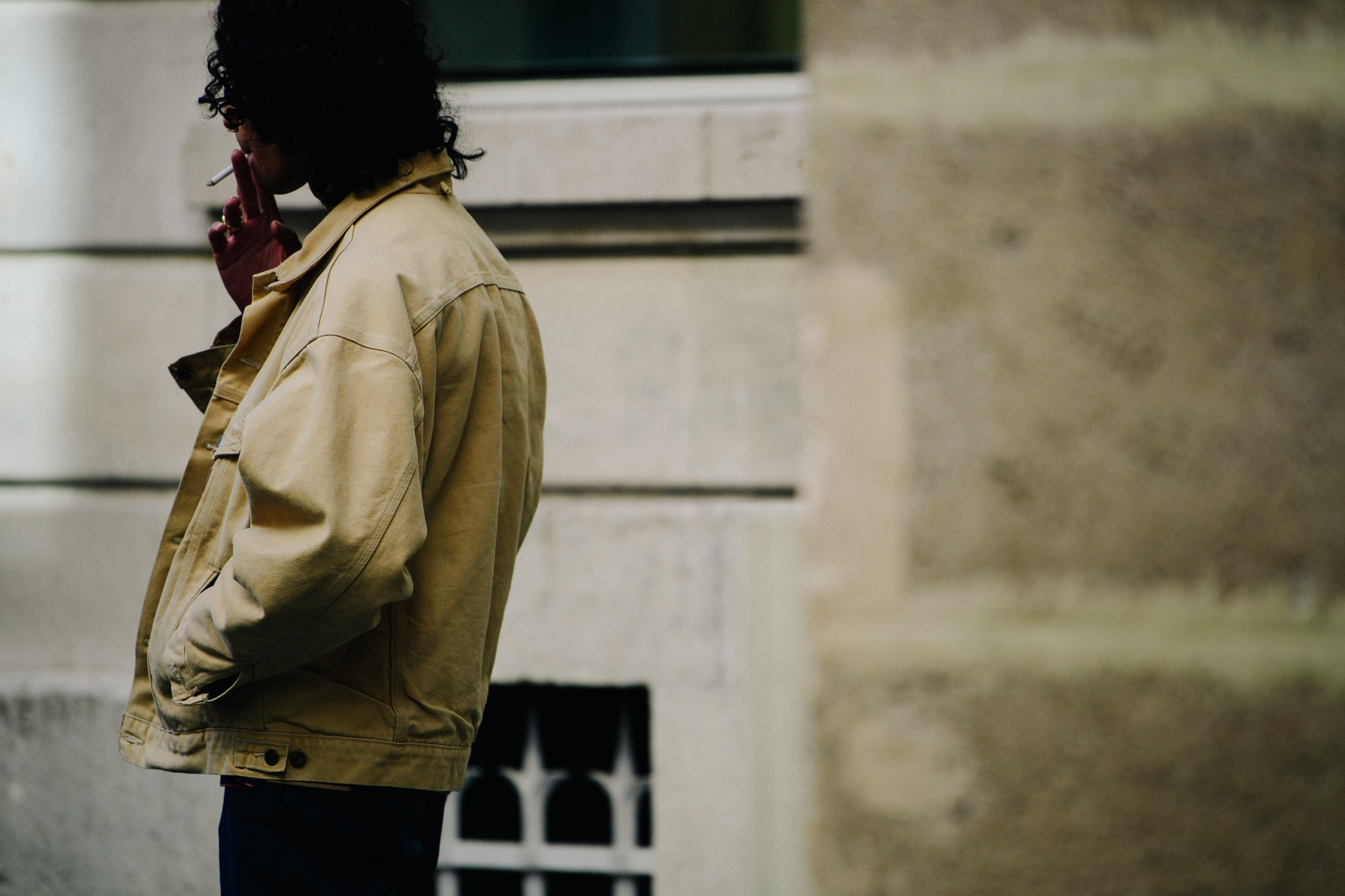 Man wearing tan denim jacket