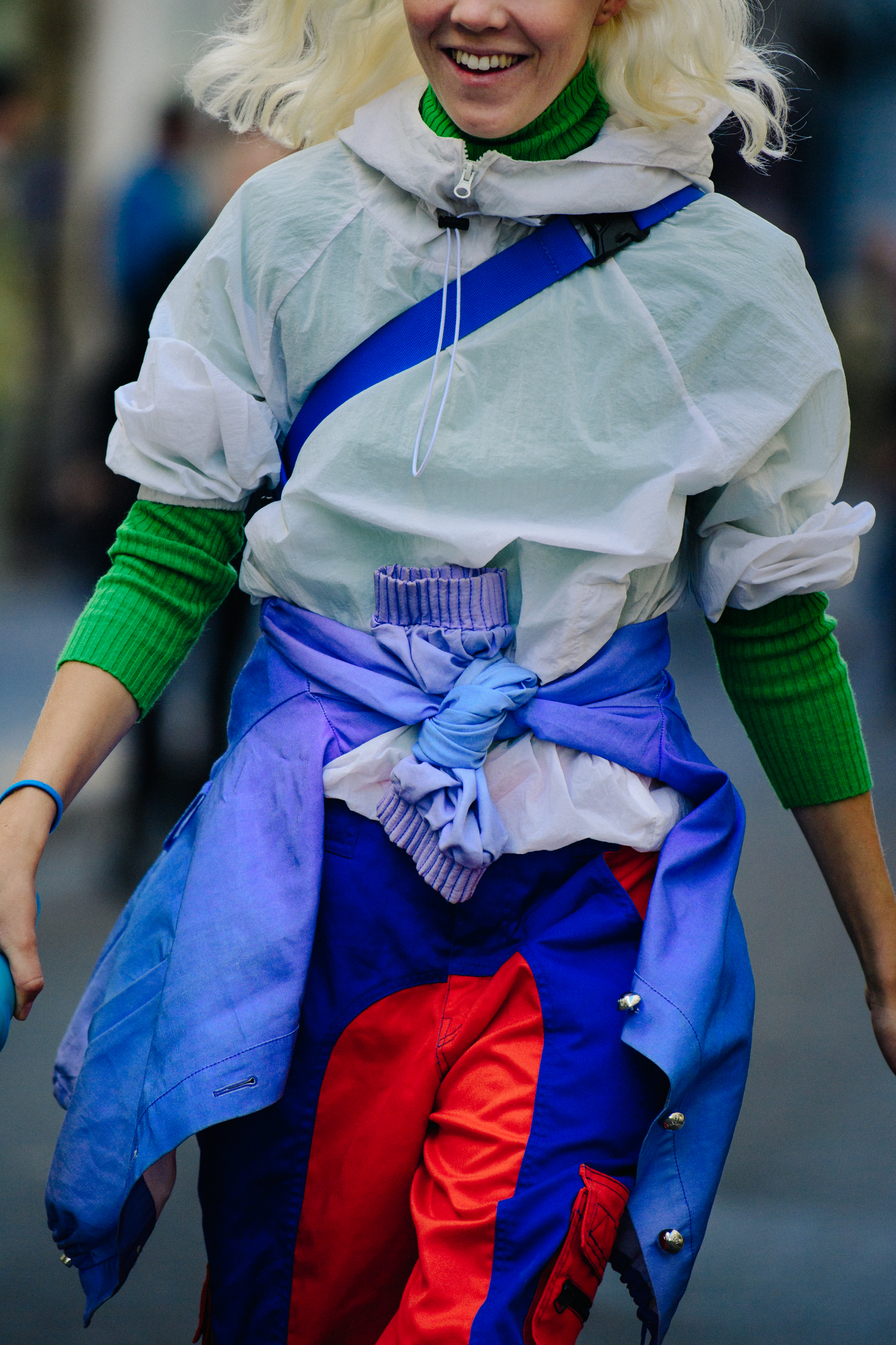Woman wearing colourful tech outfit
