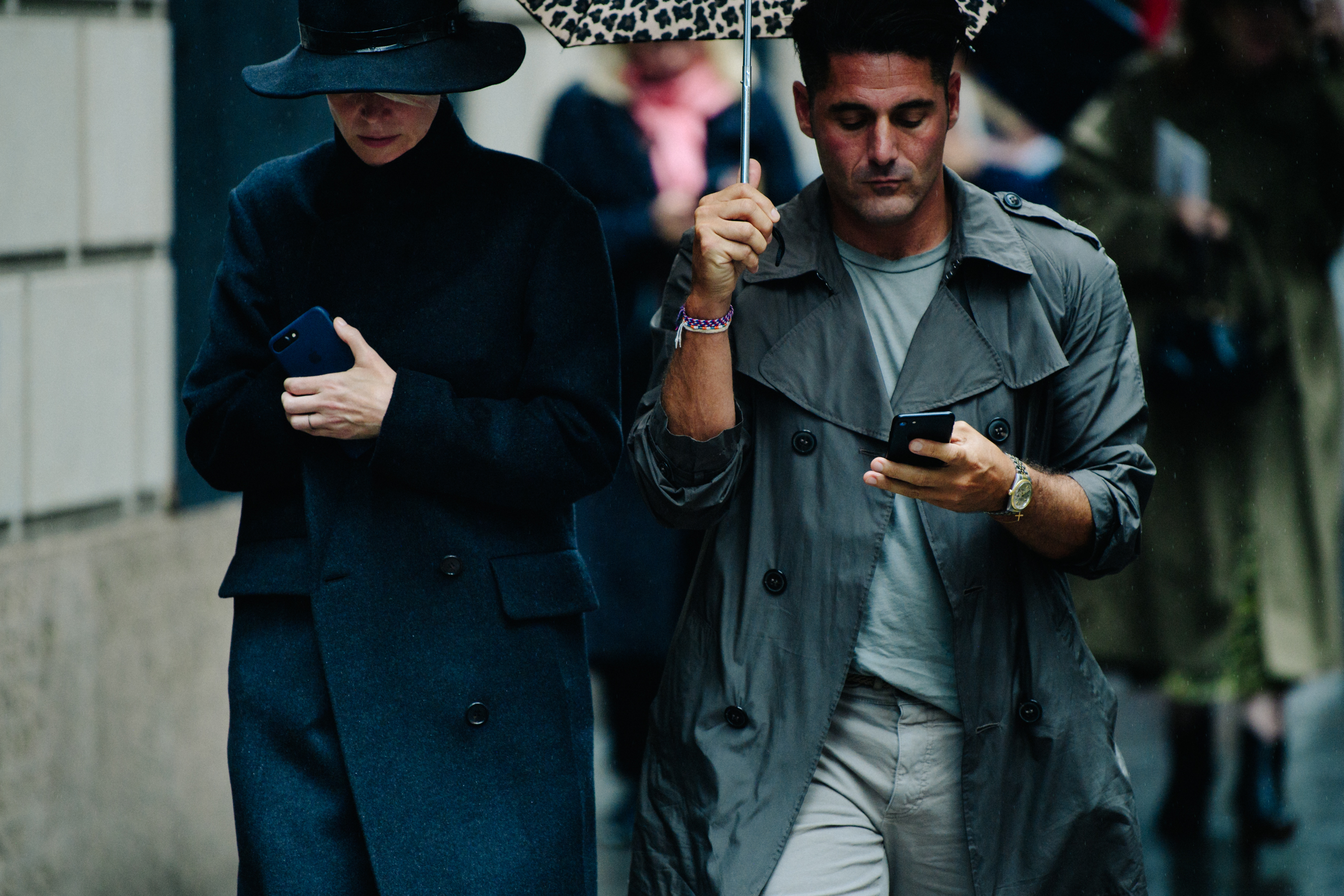 Couple wearing black and grey coats