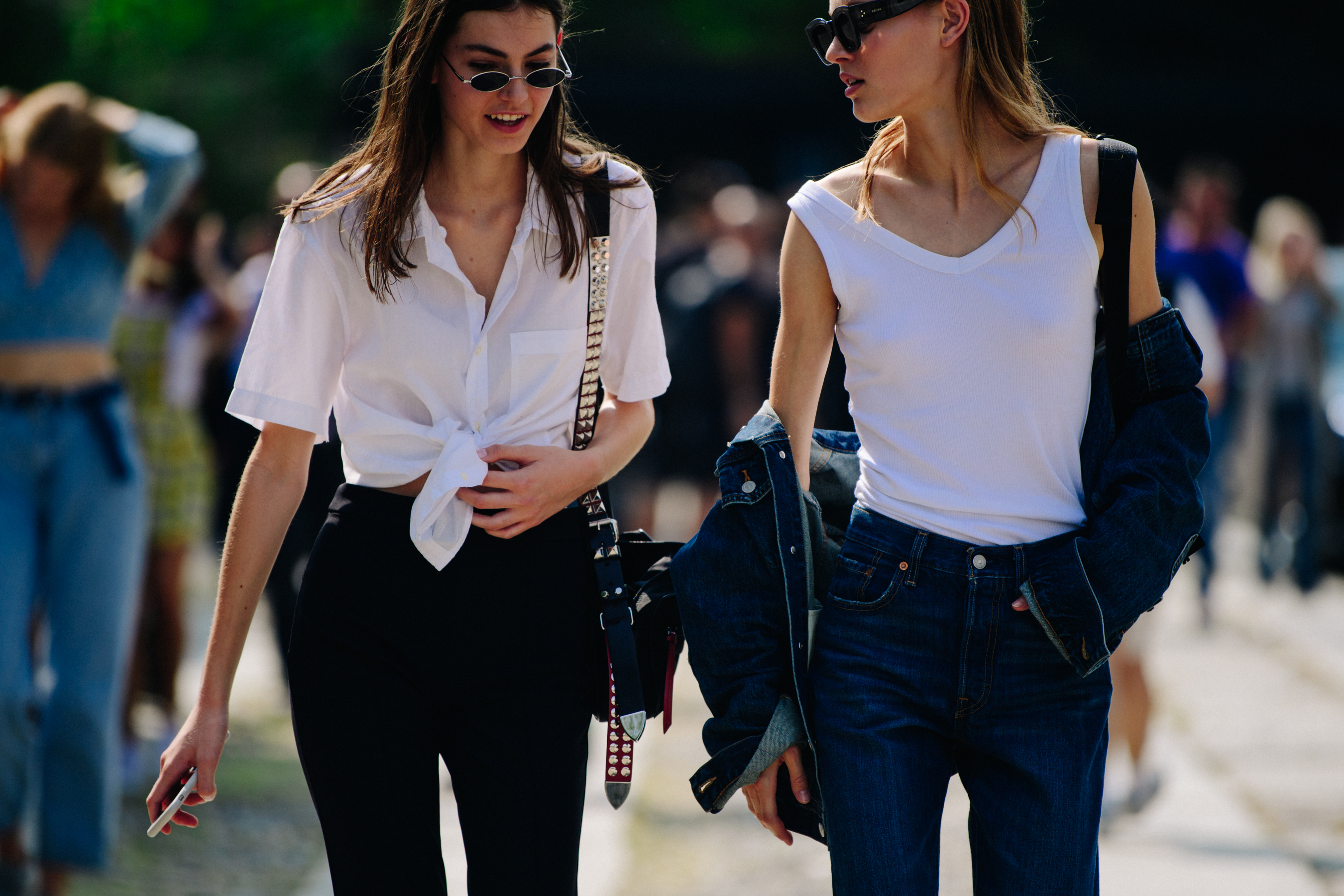Two models wearing white