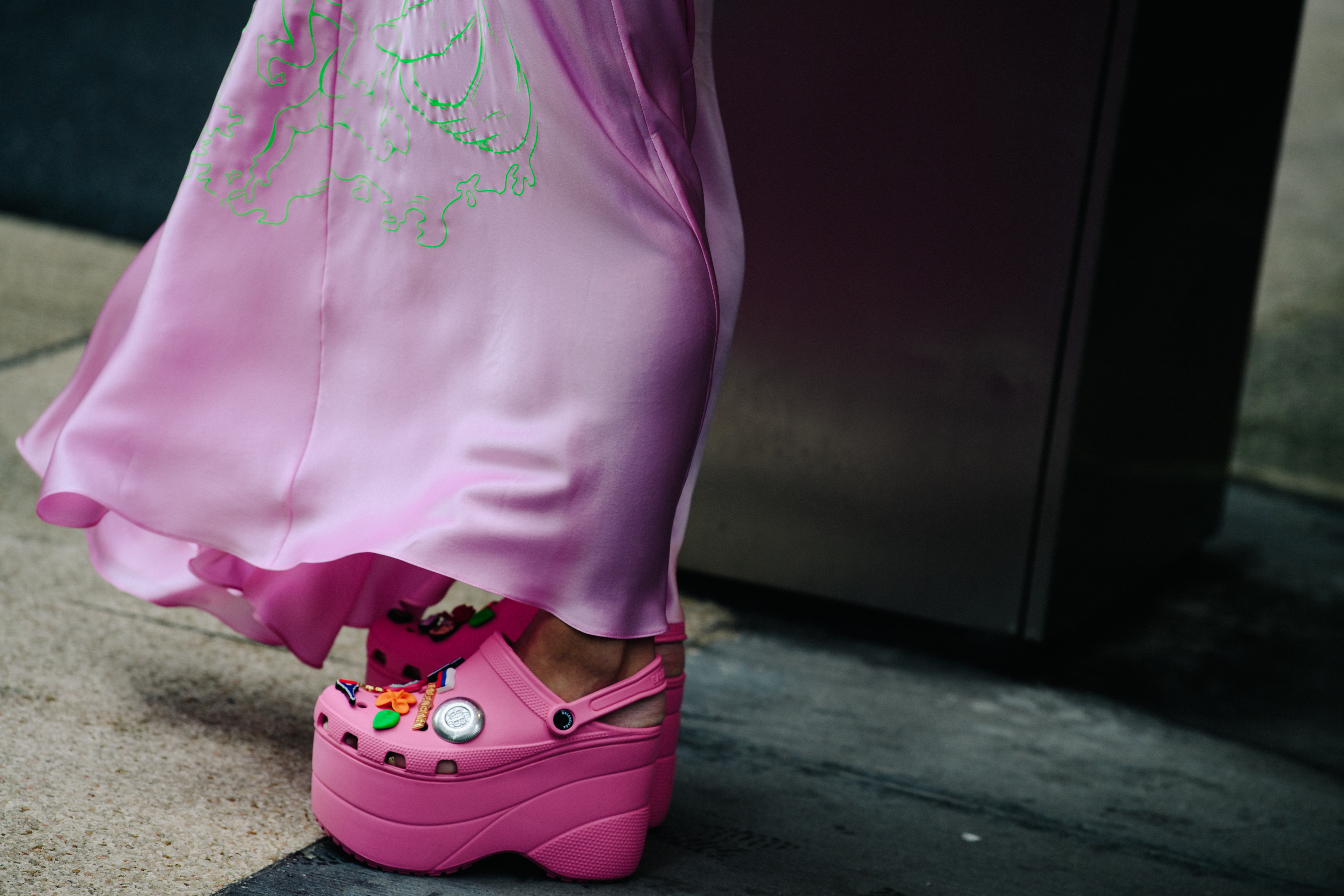 Woman wearing pink Crocs