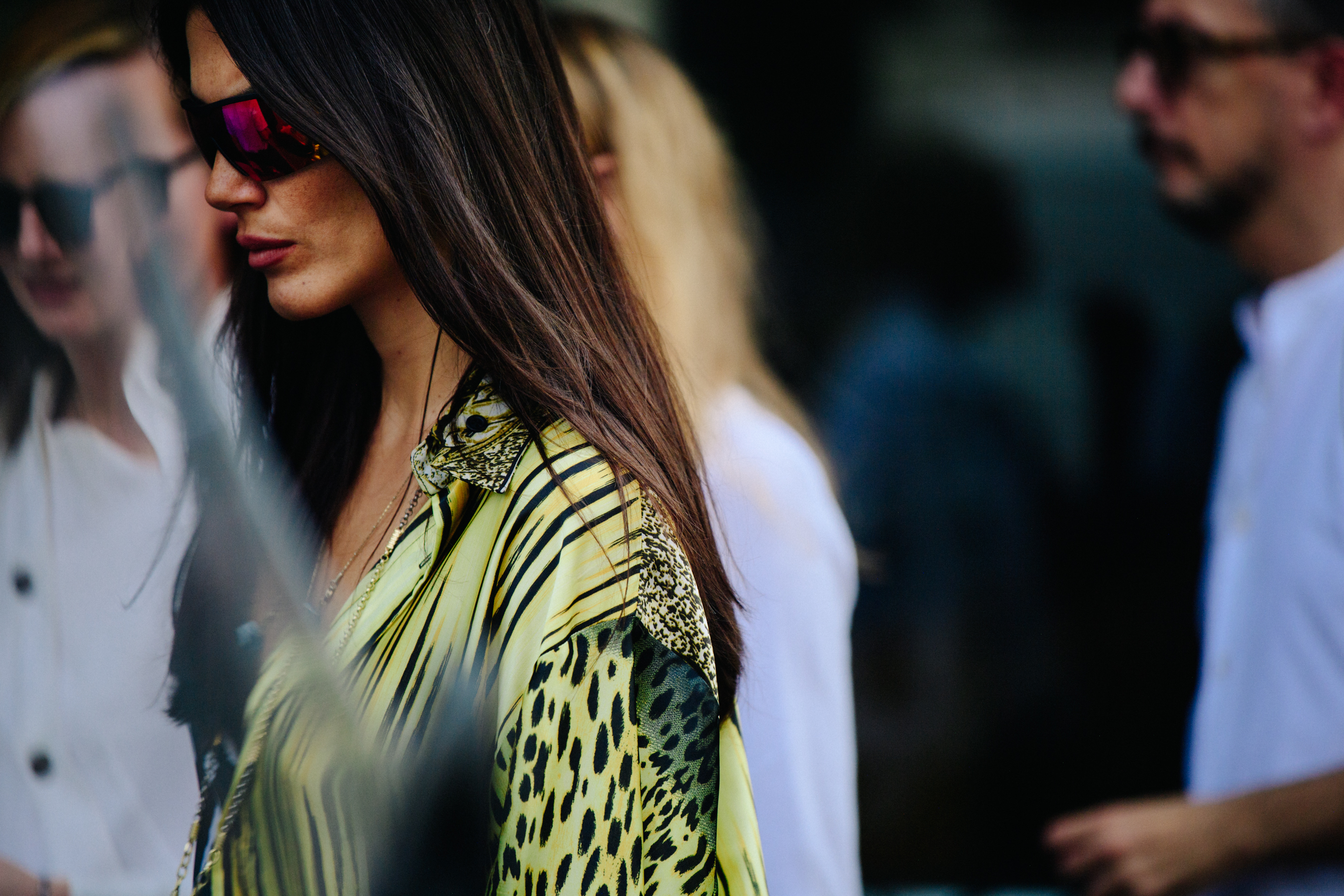 Woman wearing large sports sunglasses