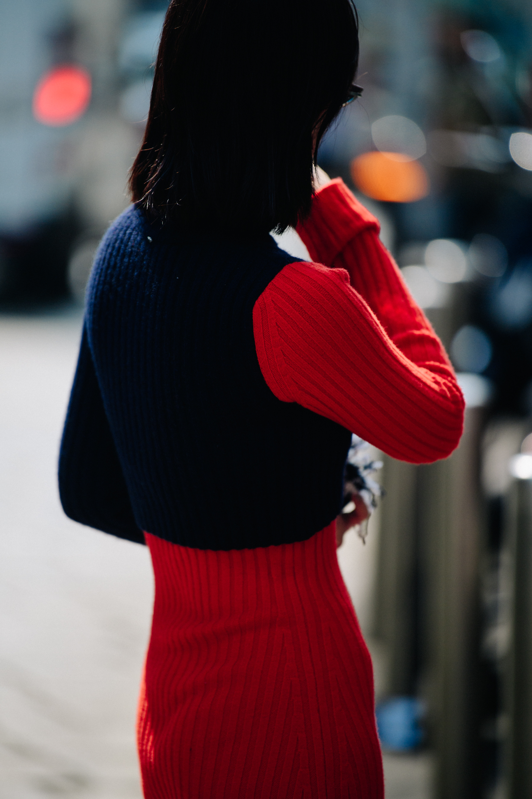 Woman wearing red knit dress