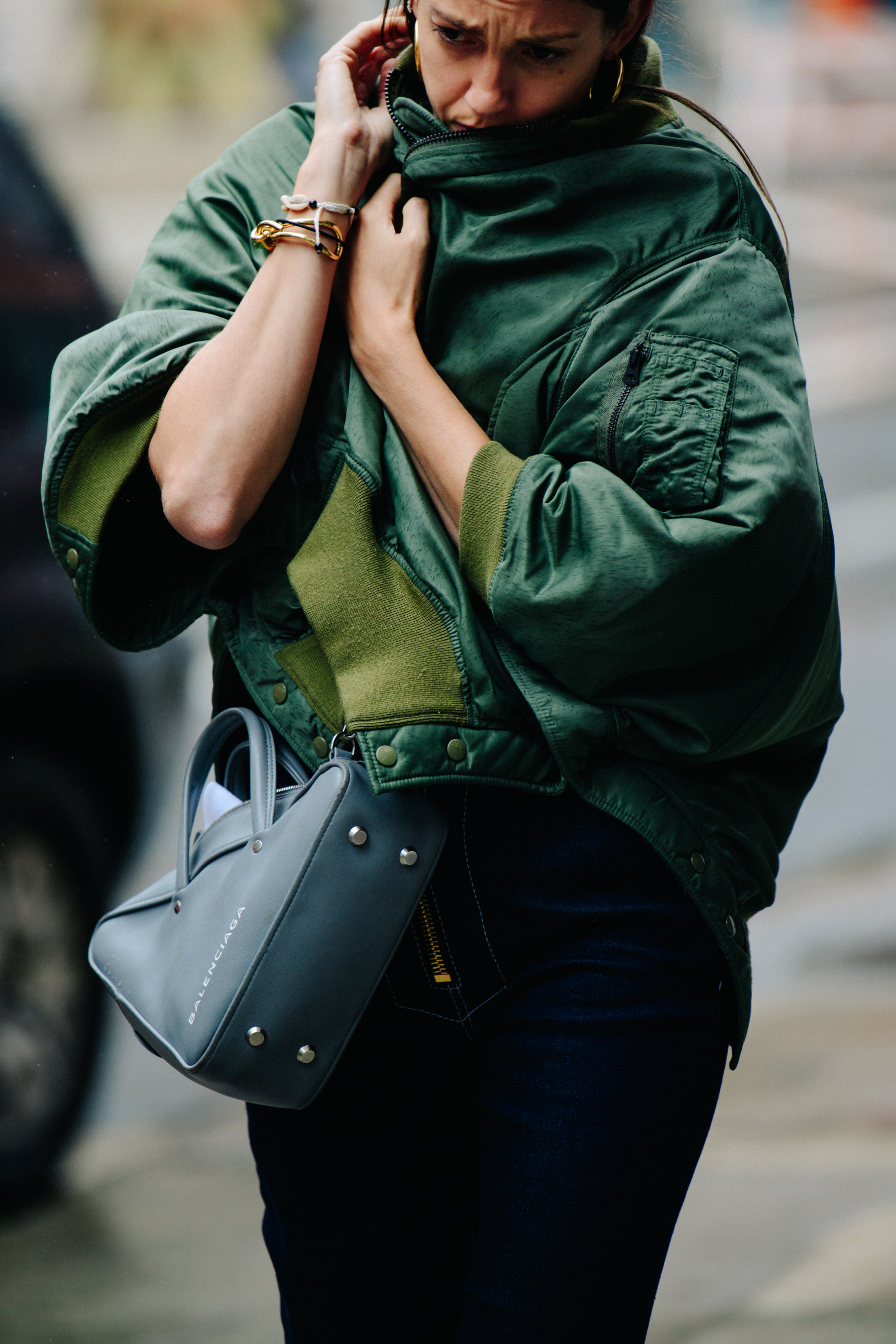 Woman wearing grren coat