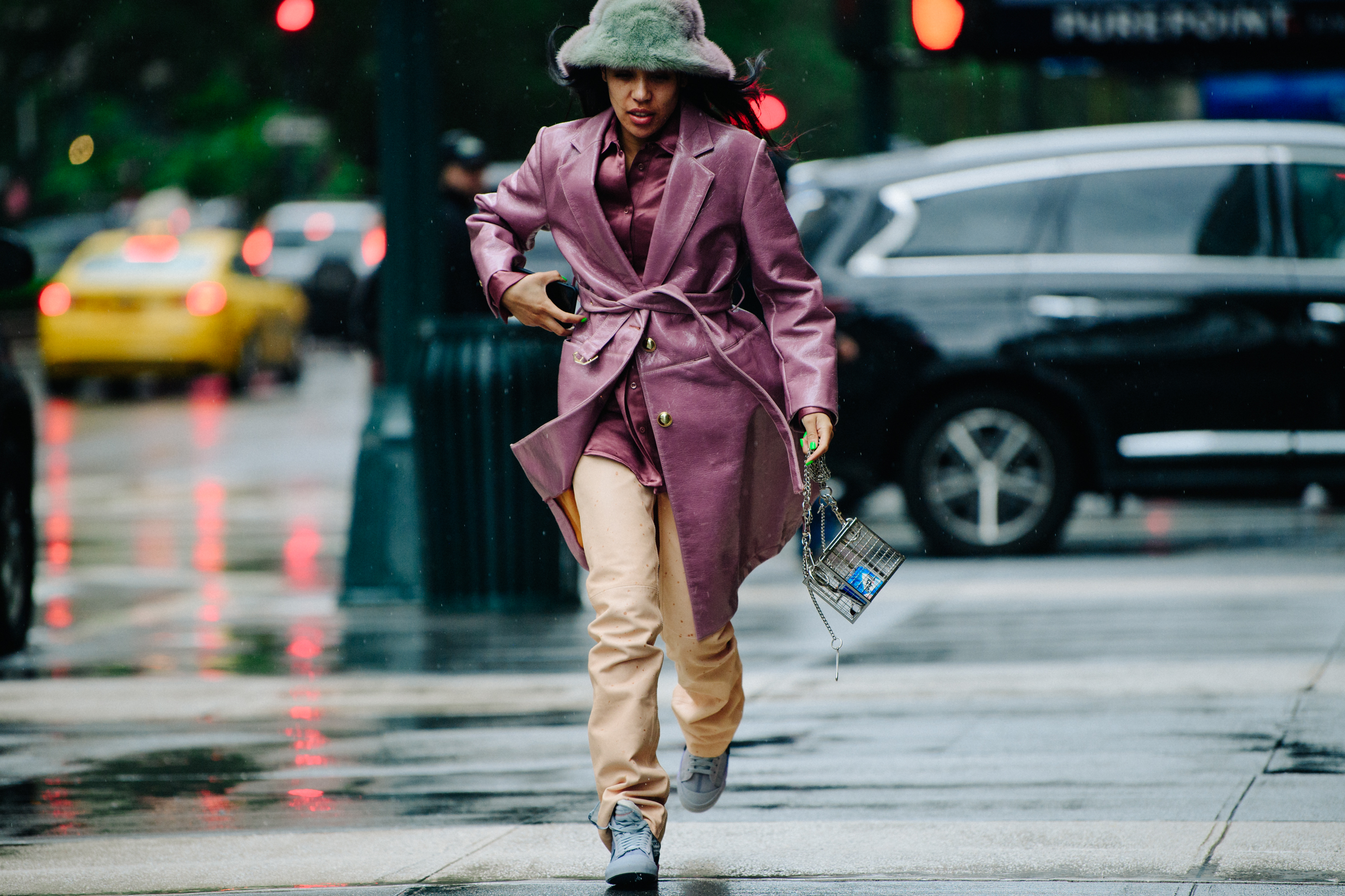 Woman wearing pink leather coat