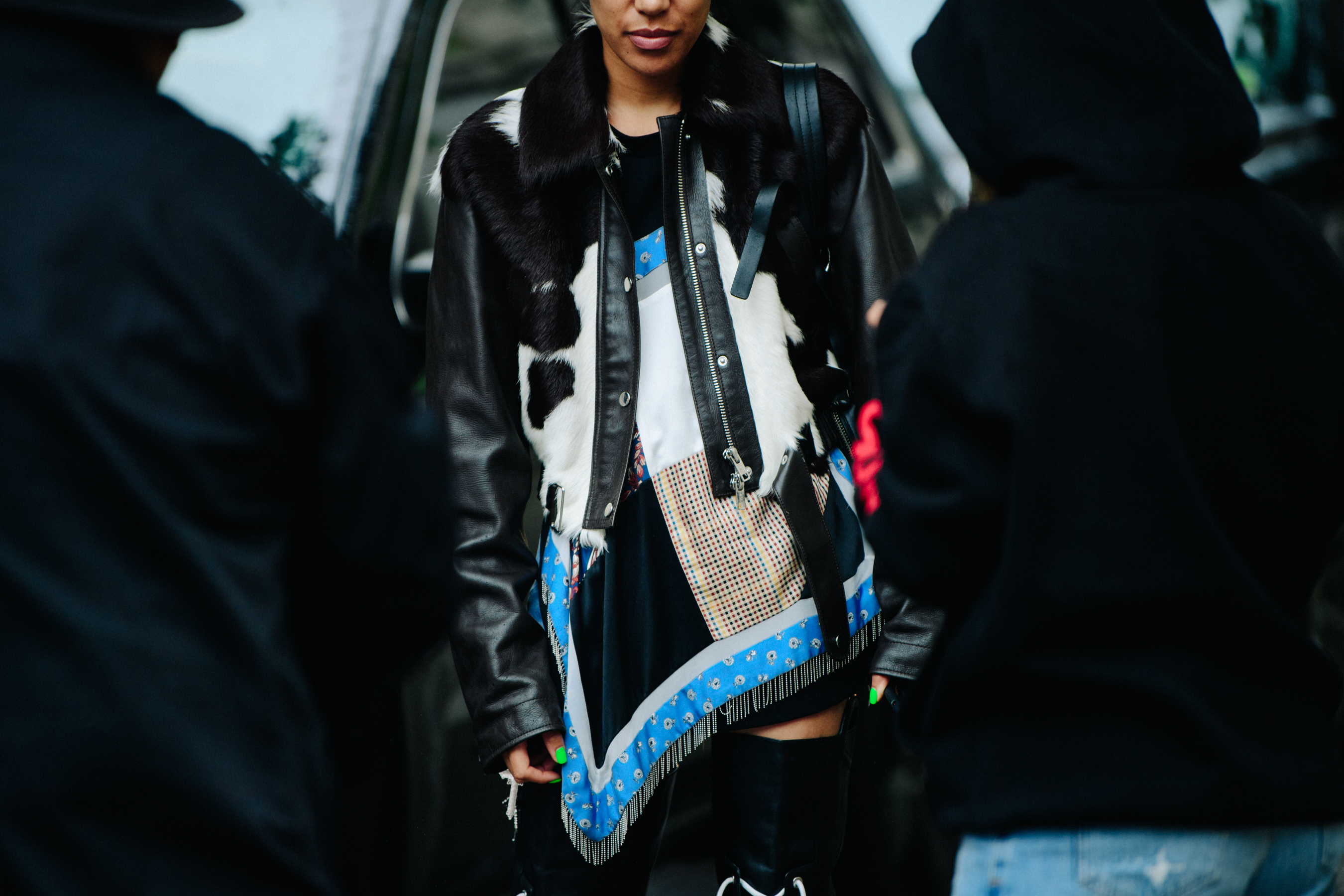 Woman wearing cowhide jacket