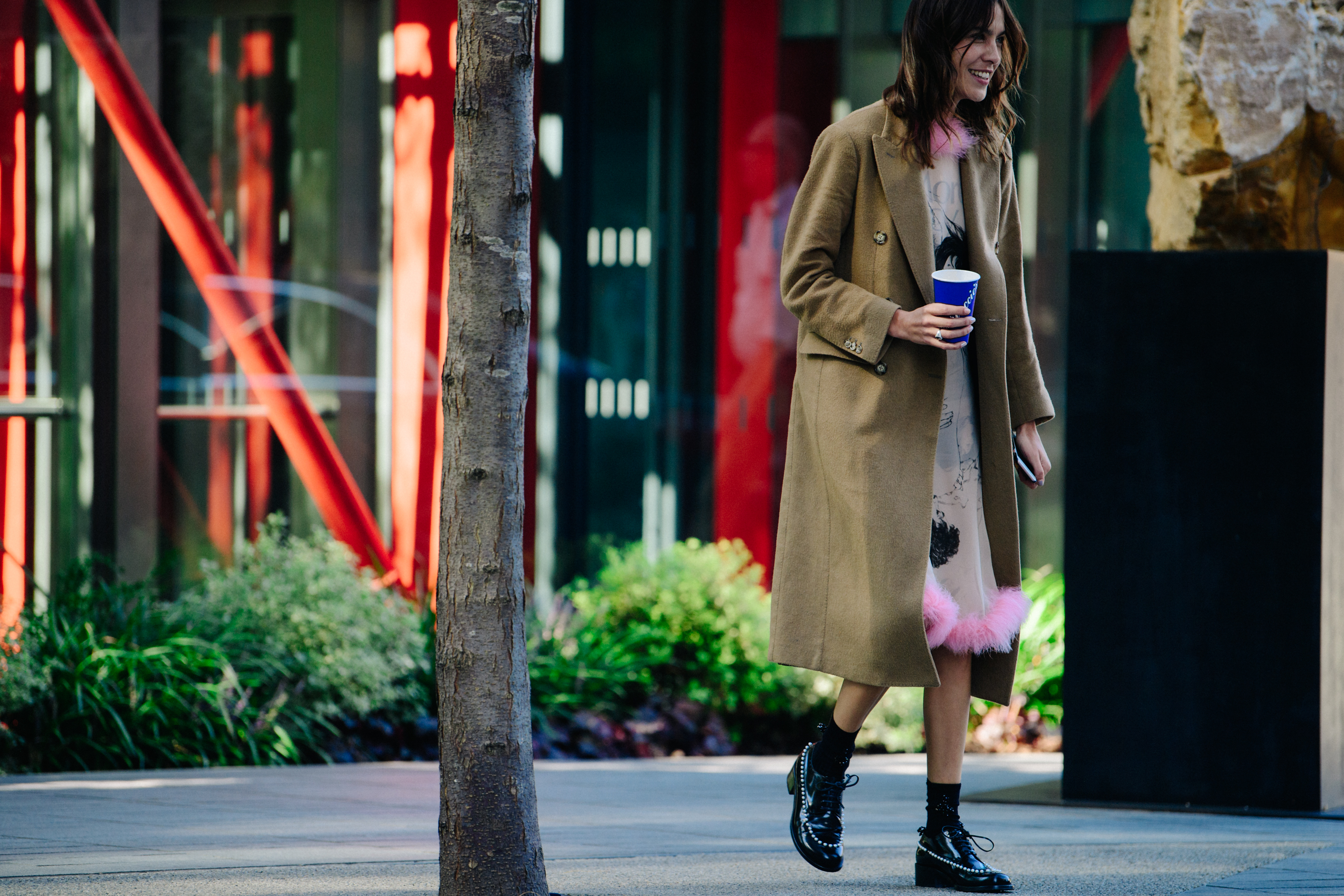 British model wearing brown coat