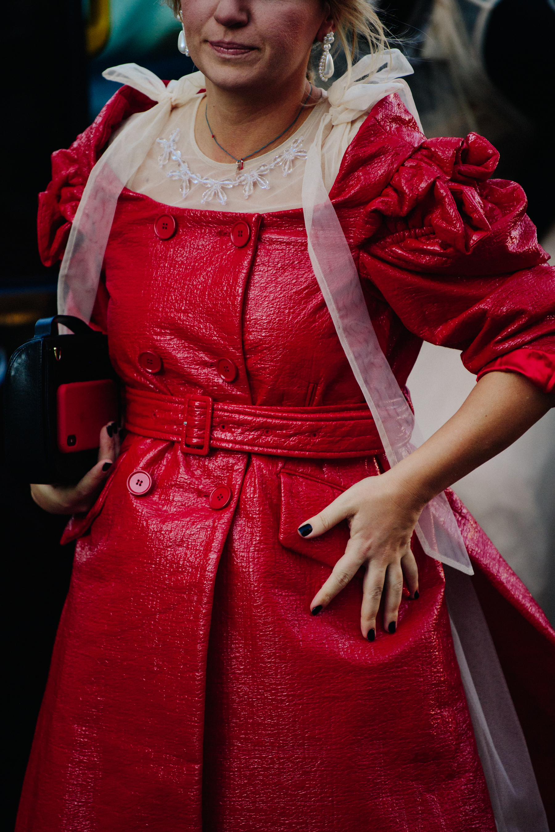 Woman wearing red leather dress