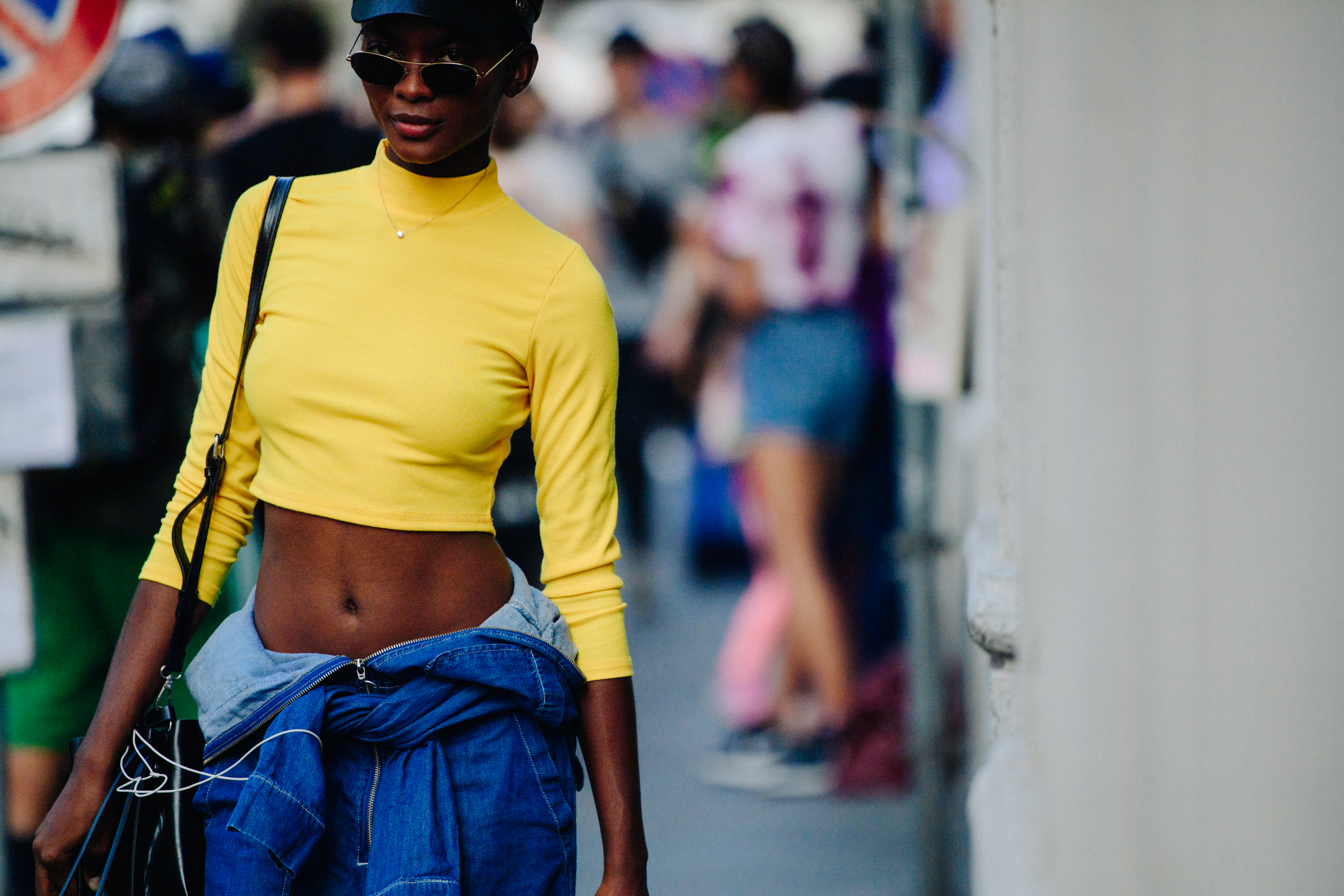 Model wearing yellow shirt