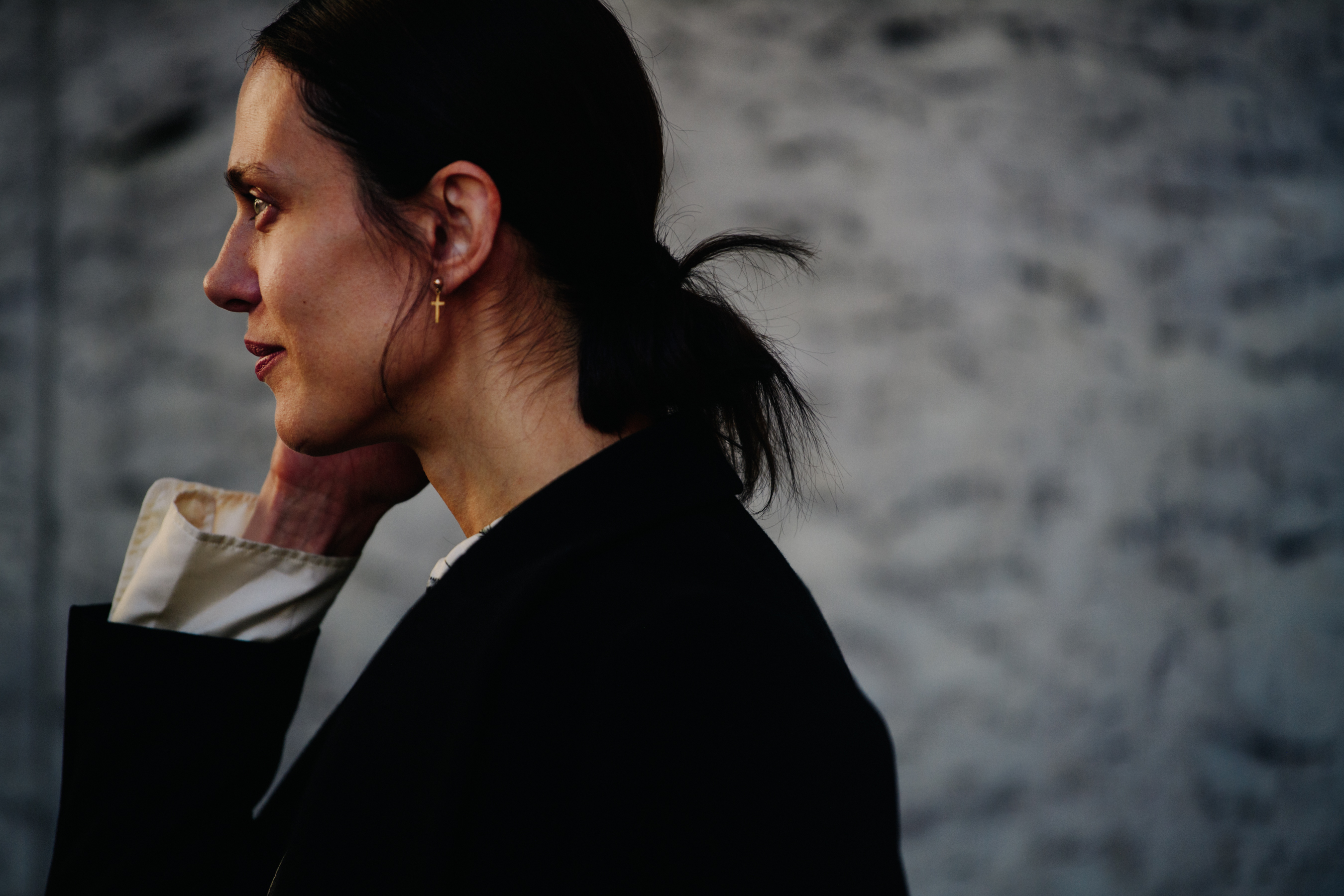 French model wearing gold earring