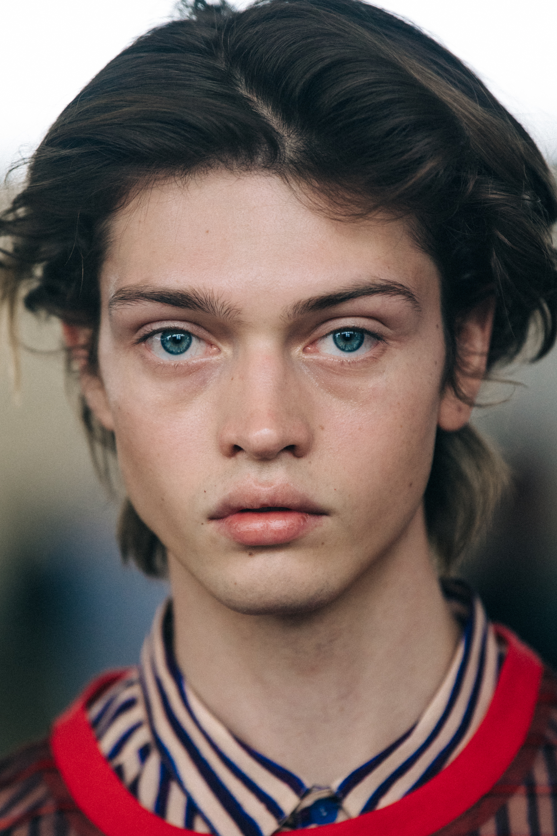 Portrait of model with short dark hair
