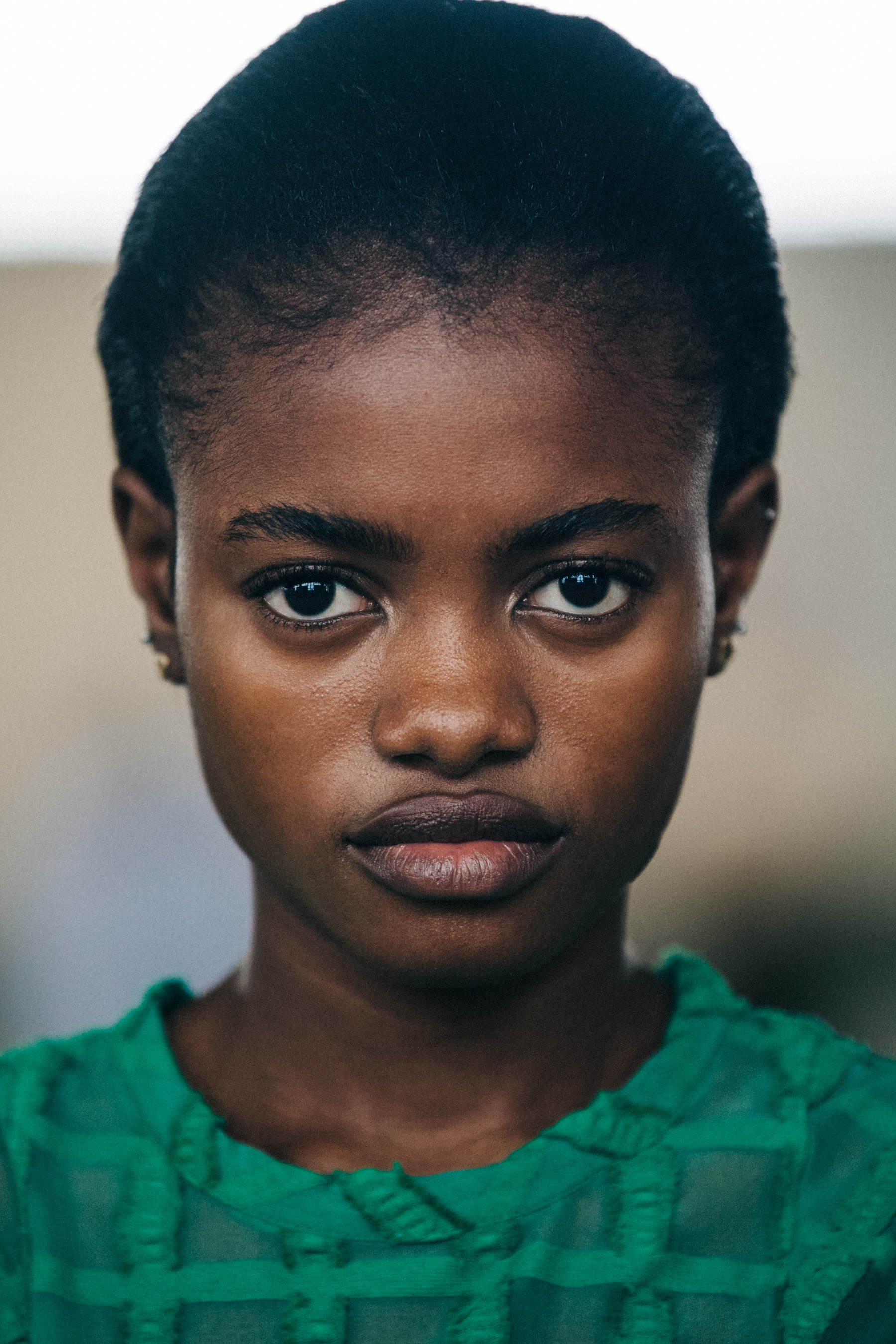 Portrait of model with short black hair