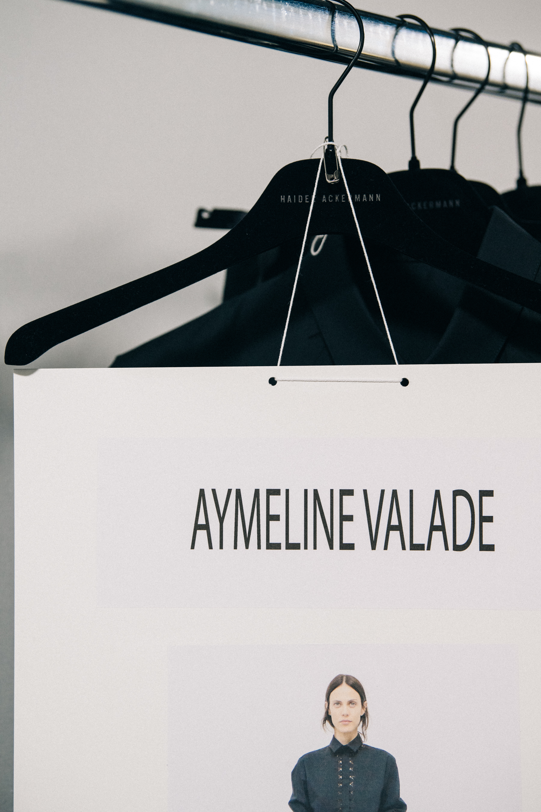 Clothes hanging backstage at Haider Ackermann