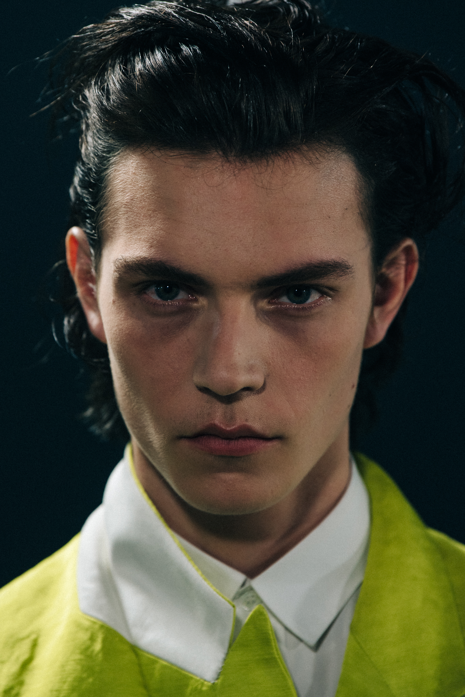 Portrait of model with slicked back hair